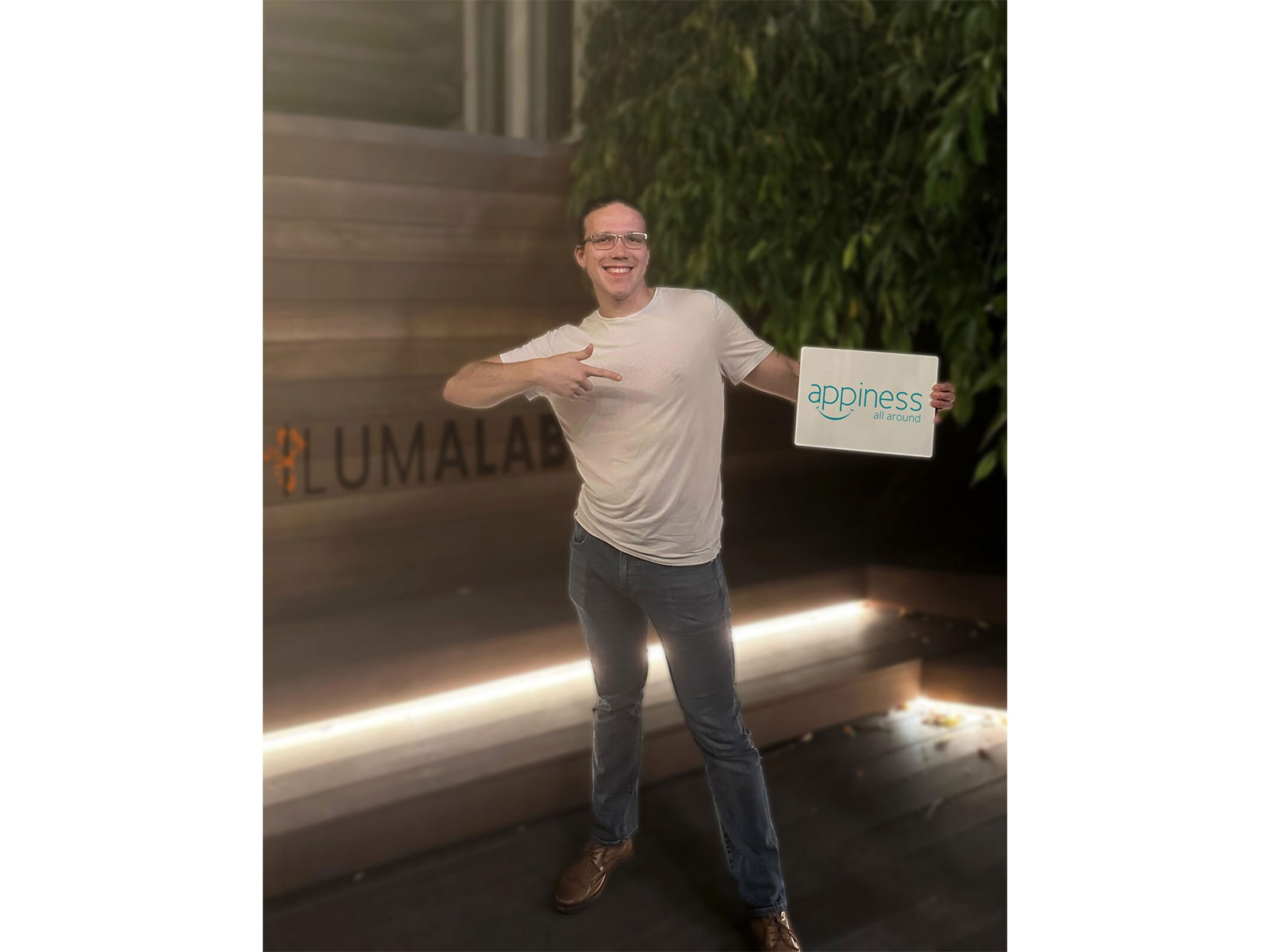 Patrik Šlachta, Founder, iLumaLab holding the logo of Appiness