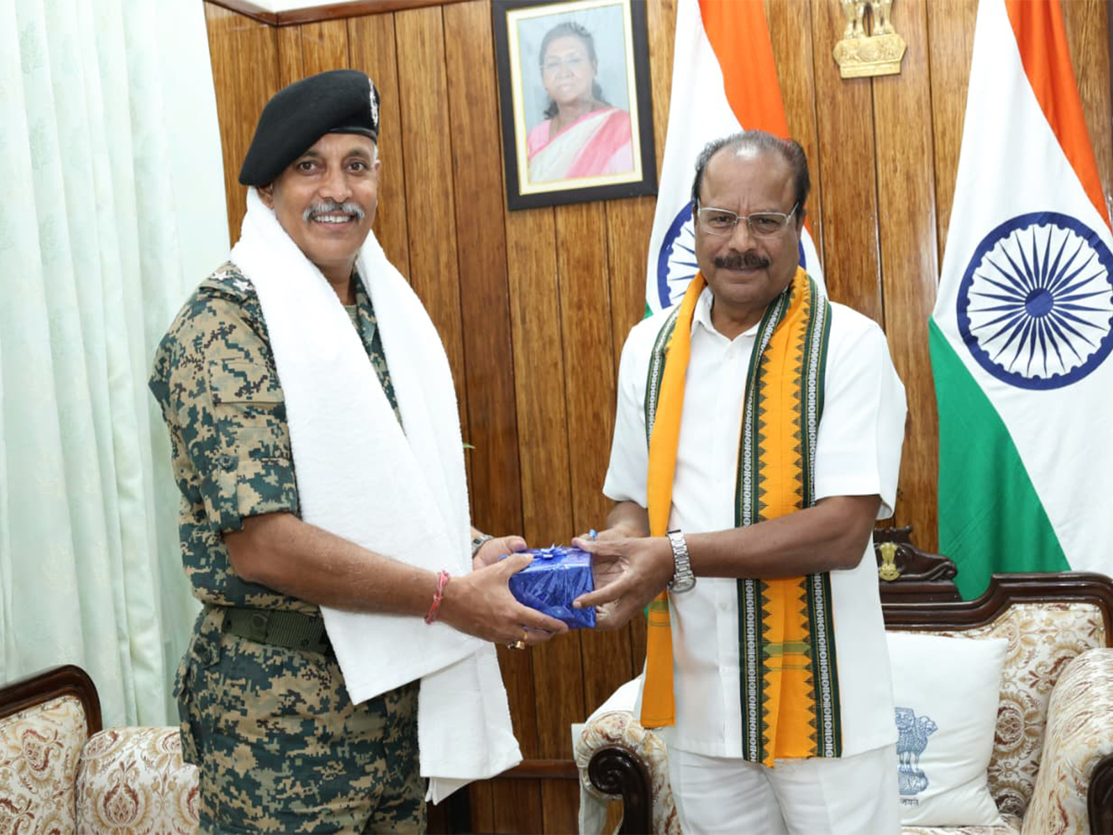 Inspector General, BSF Tripura Frontier Aloke Kumar Chakraborty with Tripura Governor, Indrasena Reddy Nallu (Photo/ANI)
