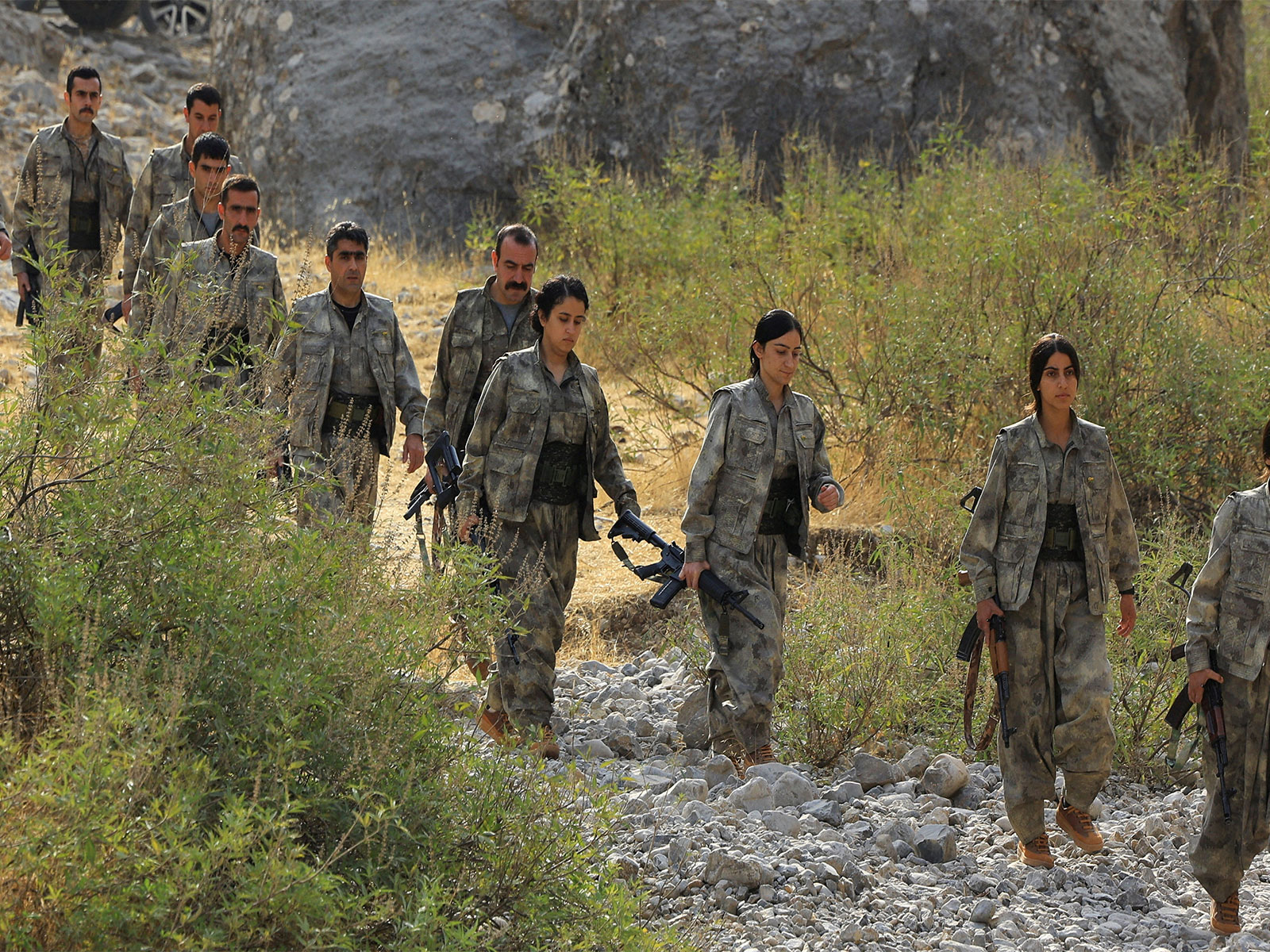 Kurdistan Workers Party (PKK) members walking for a disarmament ceremny to Qandil (Photo/Reuters)