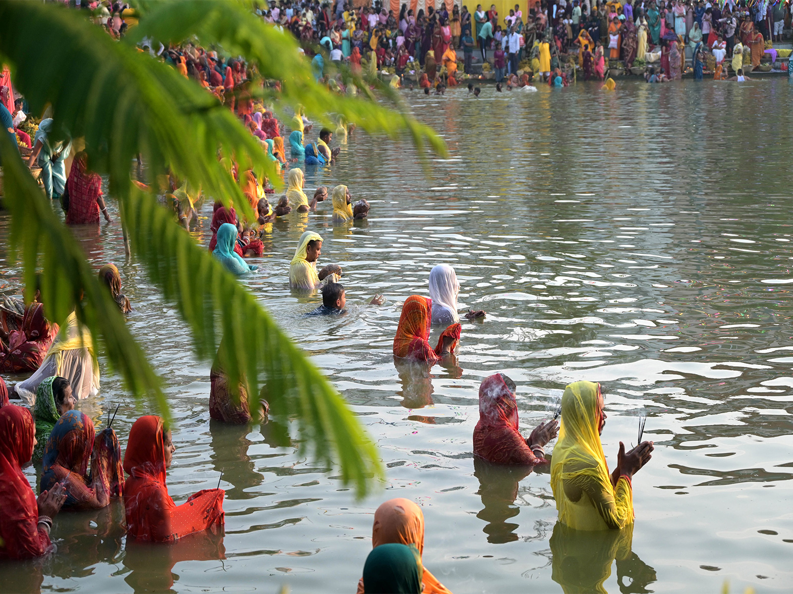Devotees perform rituals during Chhat Puja (Photo/ANI)