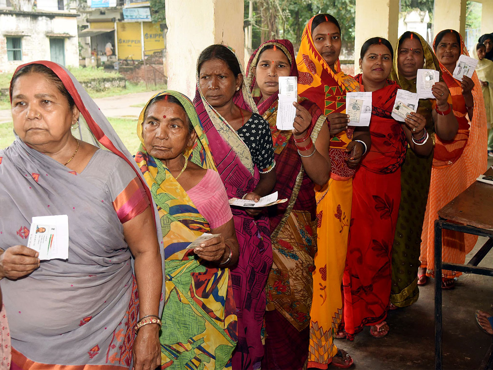 Voters in queues to cast their votes (File Photo/ANI)