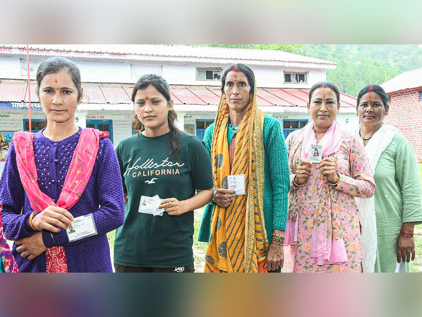 Voters standing in line waiting to cast their vote (Photo/ANI)