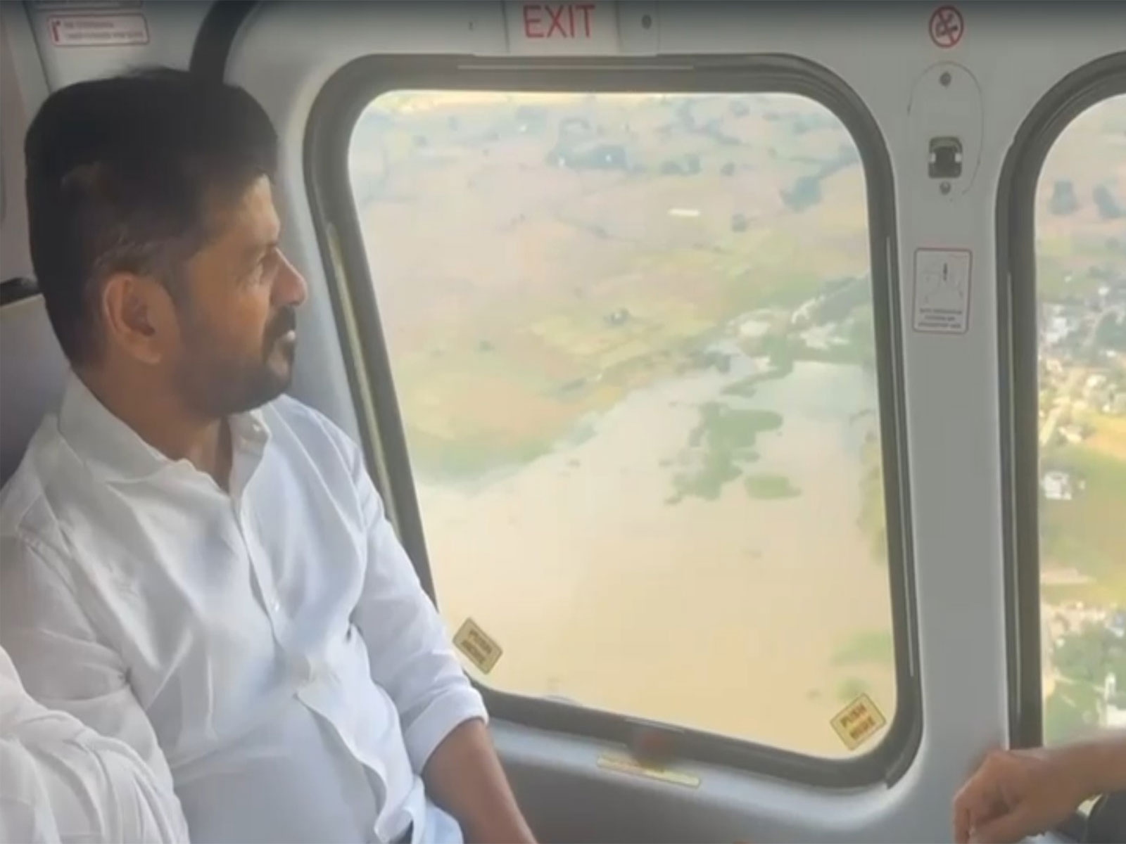 Telangana CM A Revanth Reddy conducts aerial survey of flood-ravaged areas. (Photo/ANI)