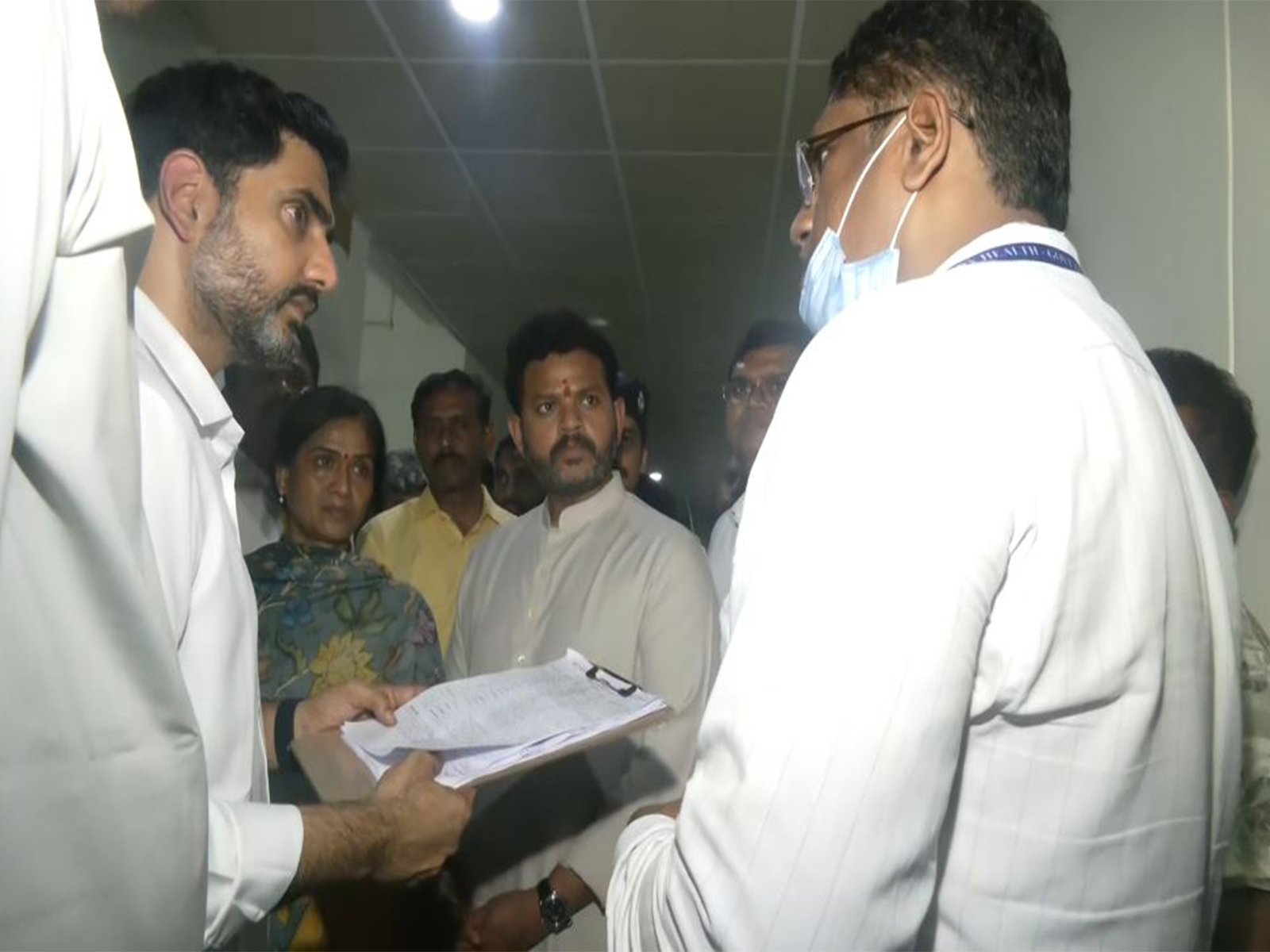 Union Minister Ram Mohan Naidu Kinjarapu and Andhra Pradesh Minister Nara Lokesh interacting with a doctor after meeting the injured people at a hospital (Photo/ANI) Union Minister Ram Mohan Naidu Kinjarapu and Andhra Pradesh Minister Nara Lokesh interacting with a doctor after meeting the injured people at a hospital (Photo/ANI)