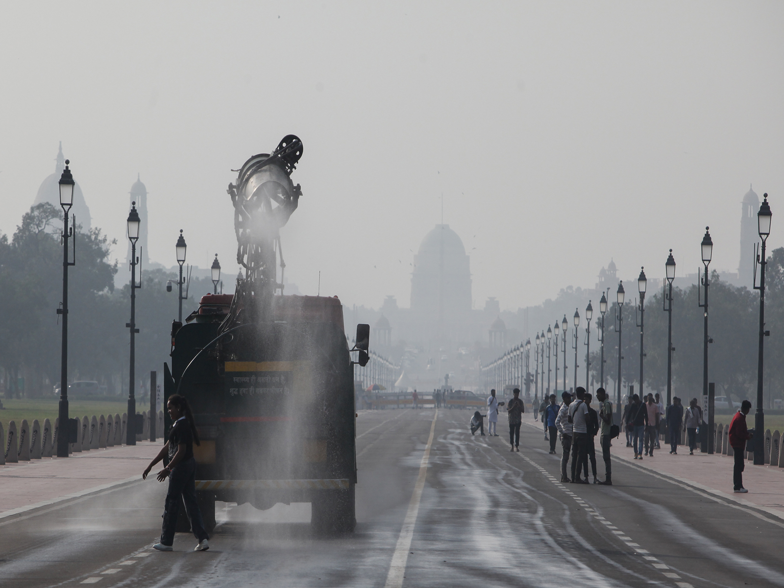 An anti-smog gun sprays water droplets across Delhi. (Photo/ANI) An anti-smog gun sprays water droplets across Delhi. (Photo/ANI)