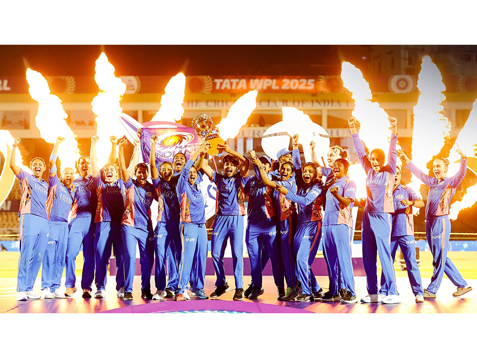 Mumbai Indians Women players celebrate with the trophy after winning the Womens Premier League 2025 (Photo: ANI)