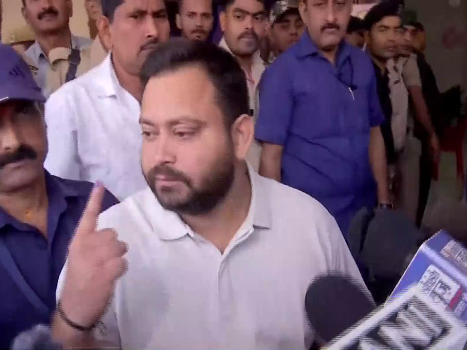 Tejashwi Yadav after casting his vote (Photo/ANI)