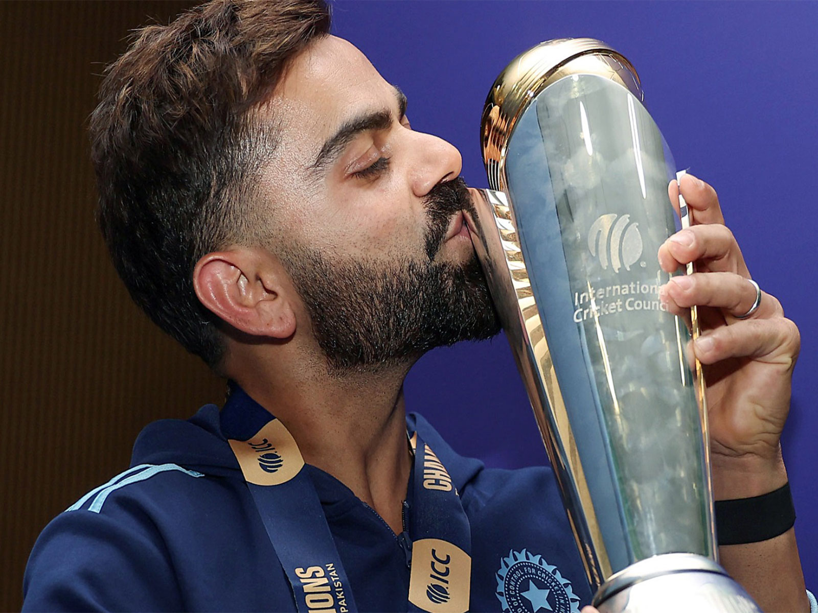 Virat Kohli with the ICC Men's Champions Trophy (Photo/ANI)
