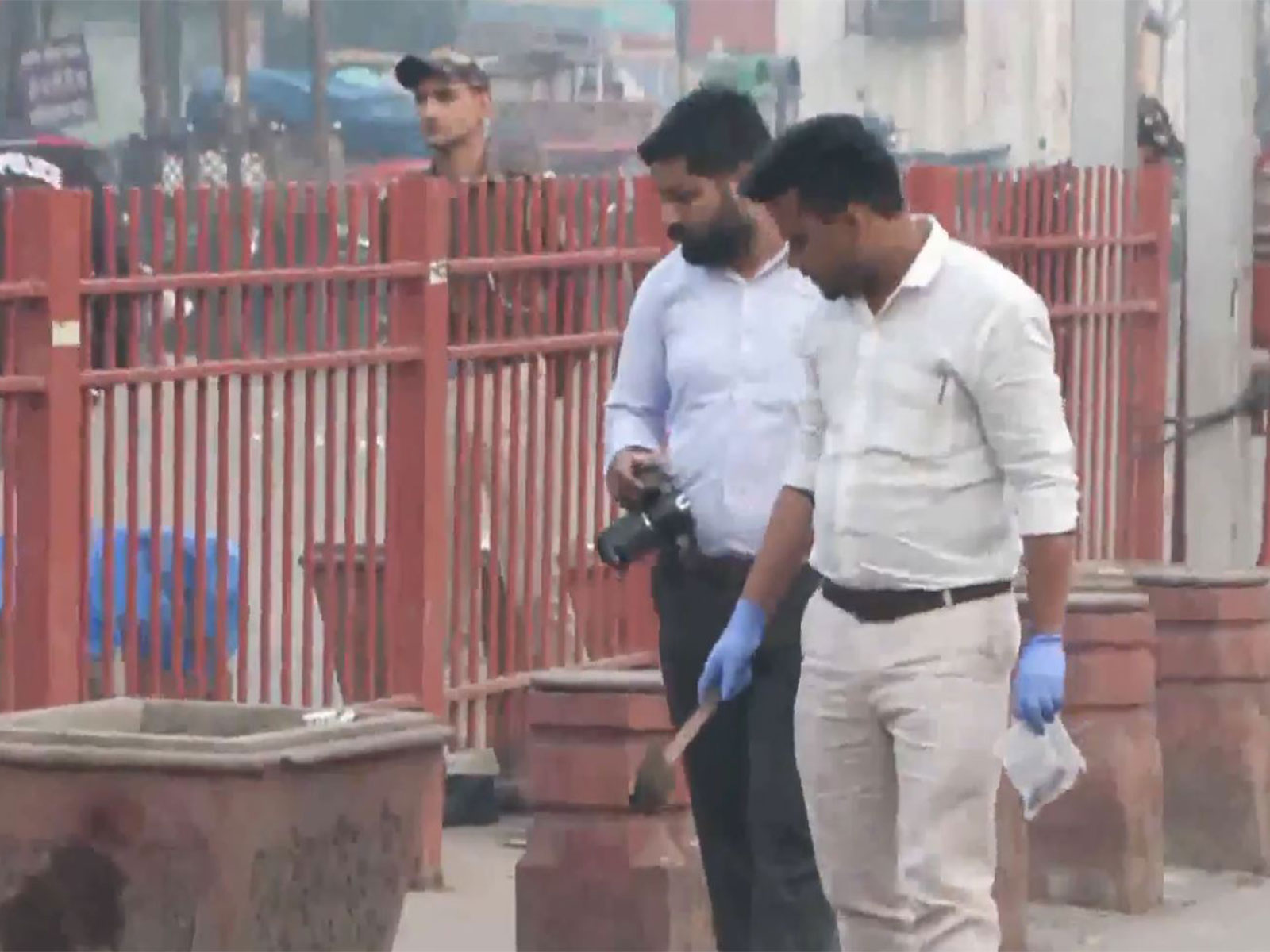 Investigation teams inspect the blast site (Photo/ANI)