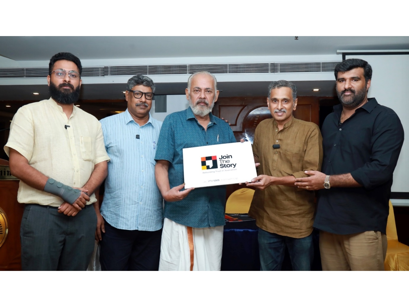 Dr. Sebastian Paul, former Press Council of India member, unveiled the logo of the new media venture ‘Join the Story’ in the presence of directors Kiran James, MP Basheer, Rajeev Shankaran, Alan John. (Left to right).