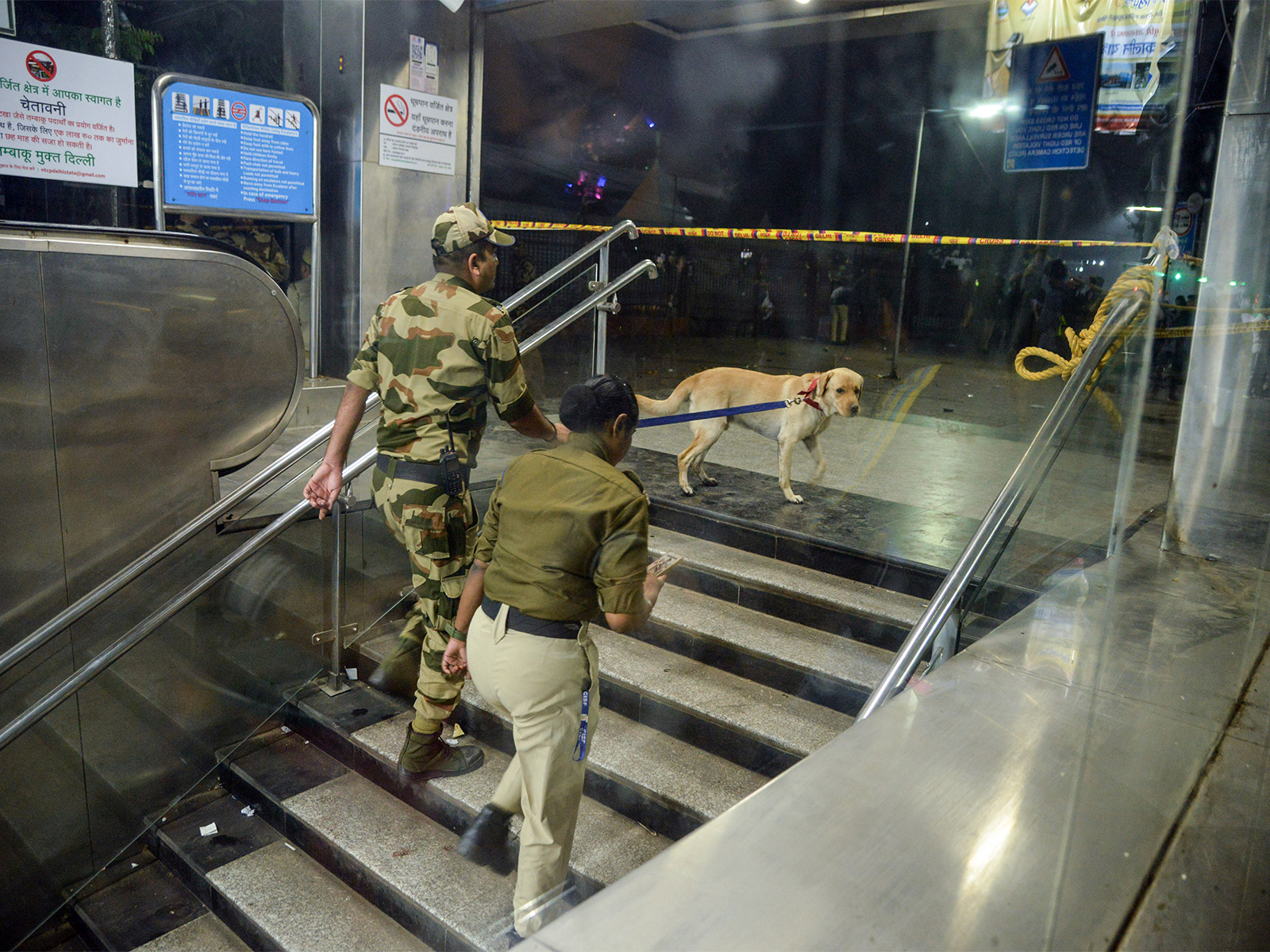 Security personnel with a sniffer dog at the Lal Quila metro station (File Photo/ANI)