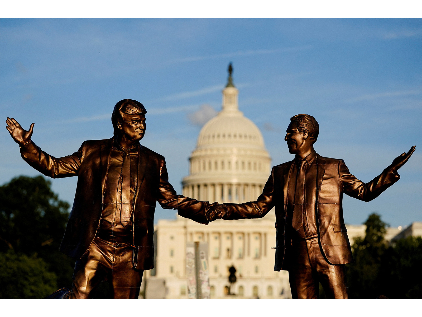 A view of a statue depicting US President Donald Trump and sex offender Jeffrey Epstein holding hands (Photo/Reuters)