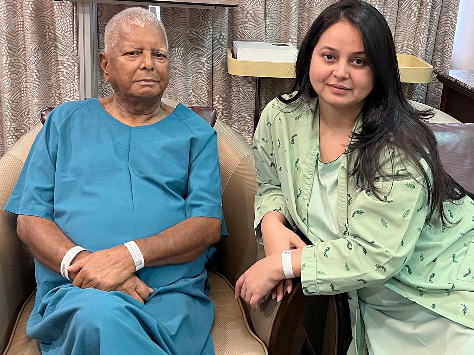 Lalu Prasad Yadav and daughter Rohini Acharya during his kidney transplant operation. (Photo/ANI)