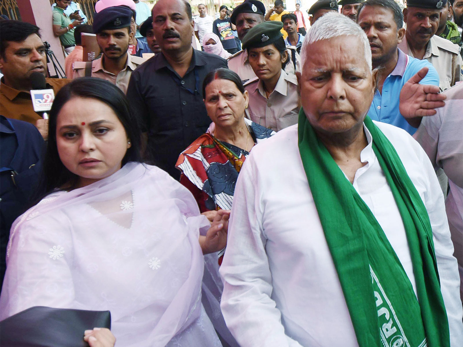RJD patriarch Lalu Prasad Yadav's daughter Rohini Acharya with Lalu Yadav. (Photo/ANI)
