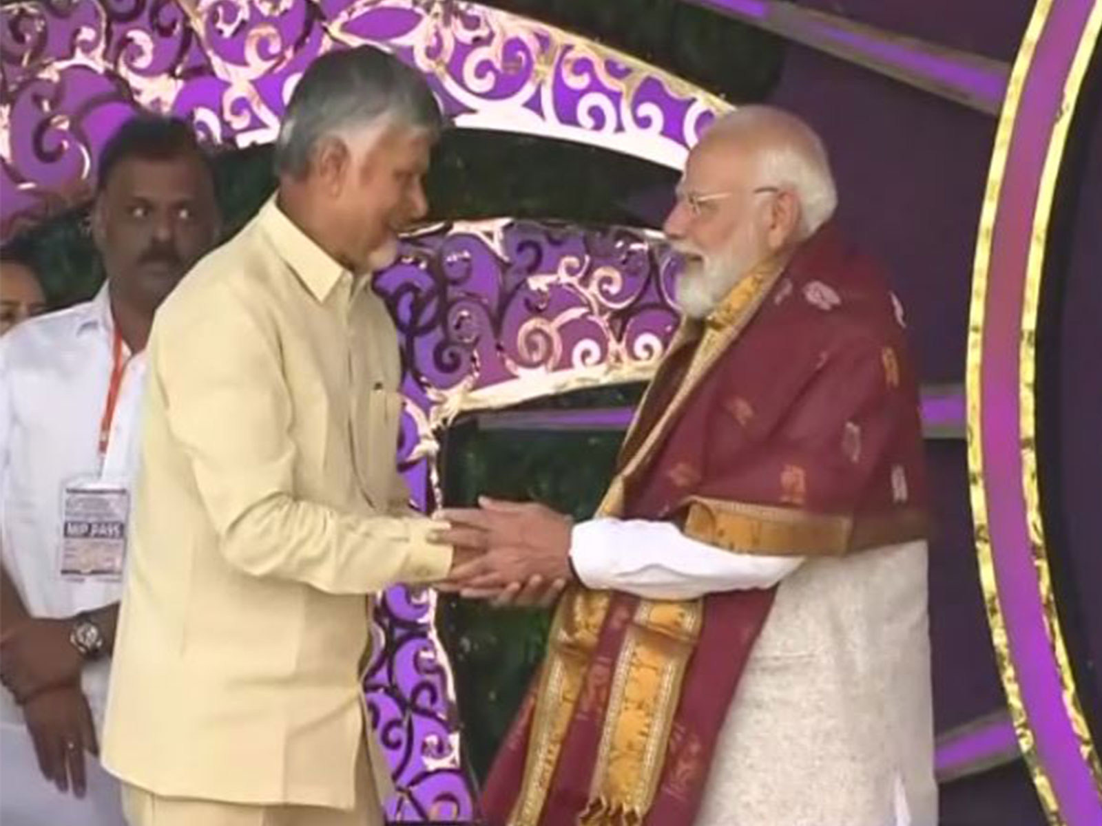 Andhra Pradesh CM N Chandrababu Naidu with PM Modi  in Puttaparthi (Photo/ANI)