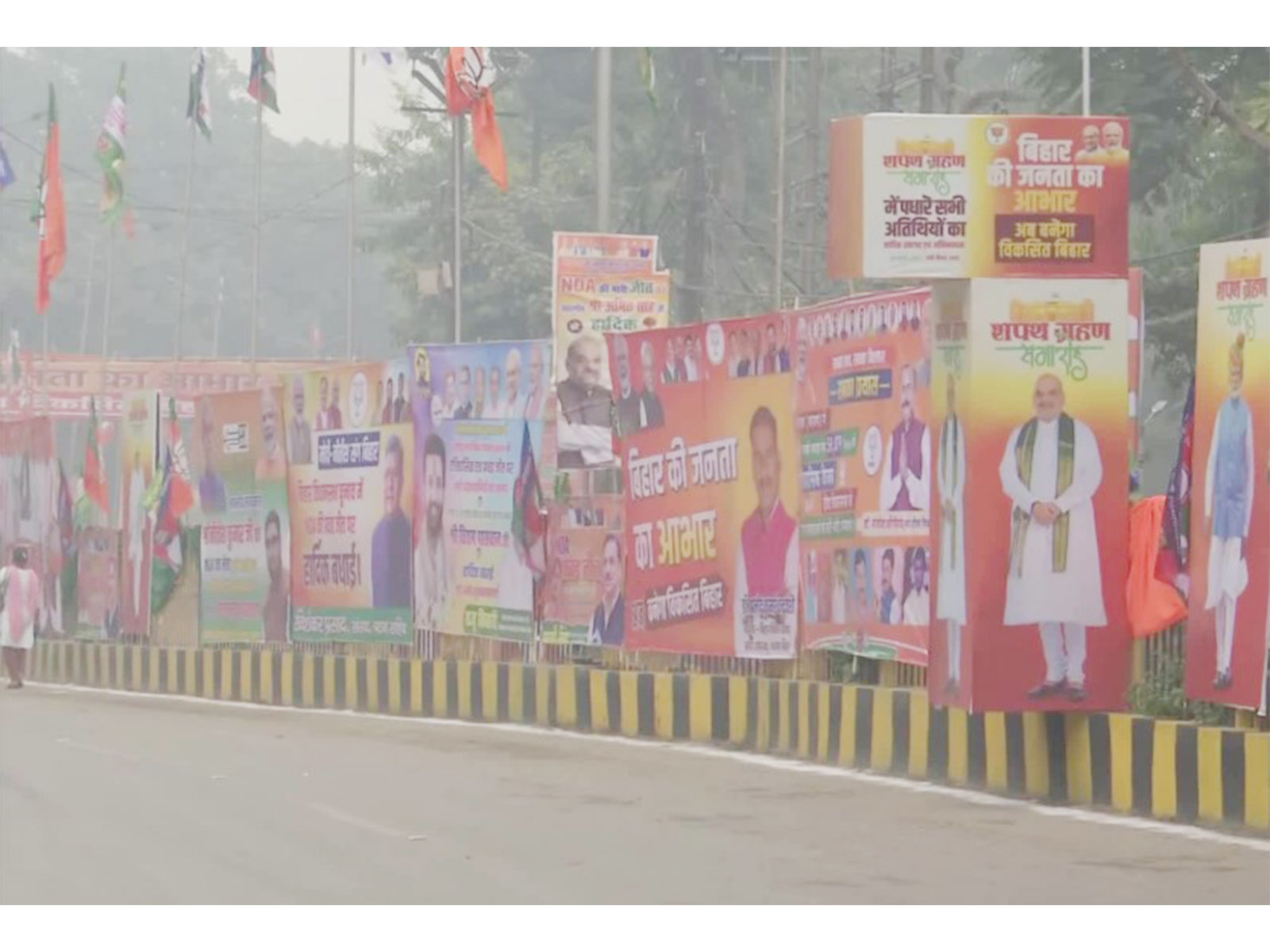 Nitish Kumar, PM Modi, Shah posters displayed outside Gandhi Maidan ahead of swearing-in ceremony in Patna. (Photo/ANI)