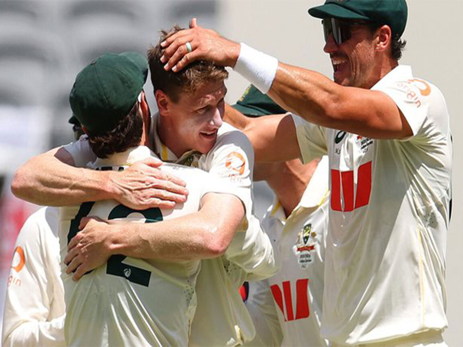 Starc (right) and Brendan Doggett (centre) were absolutely destructive. (Photo: cricket.com.au)