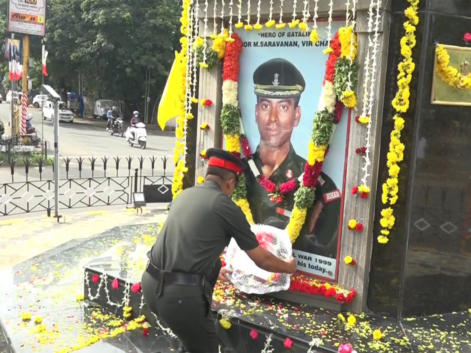 NCC officers and cadets offered flowers at memorial of Kargil hero Major Saravanan. (Photo/ANI)