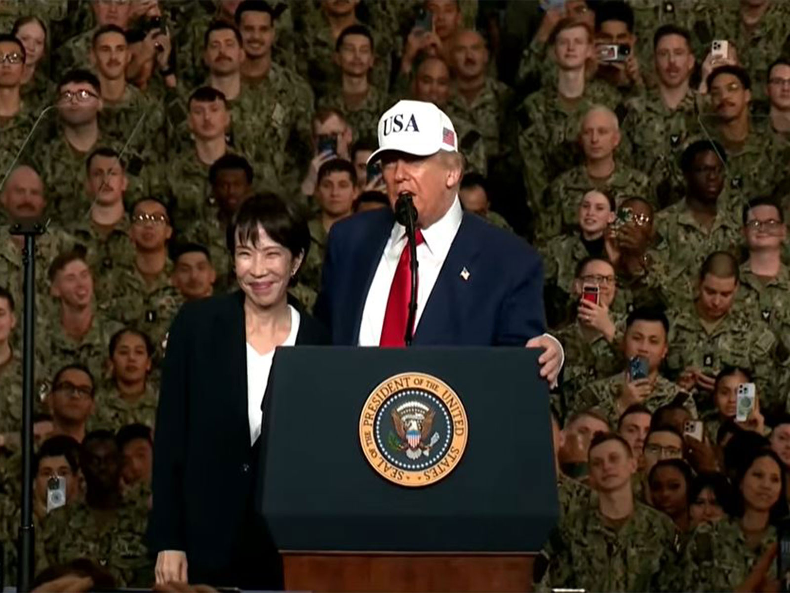US President Donald Trump with Japan PM Sanae Takaichi aboard the USS George Washington. (Image Source: The White House/YouTube)