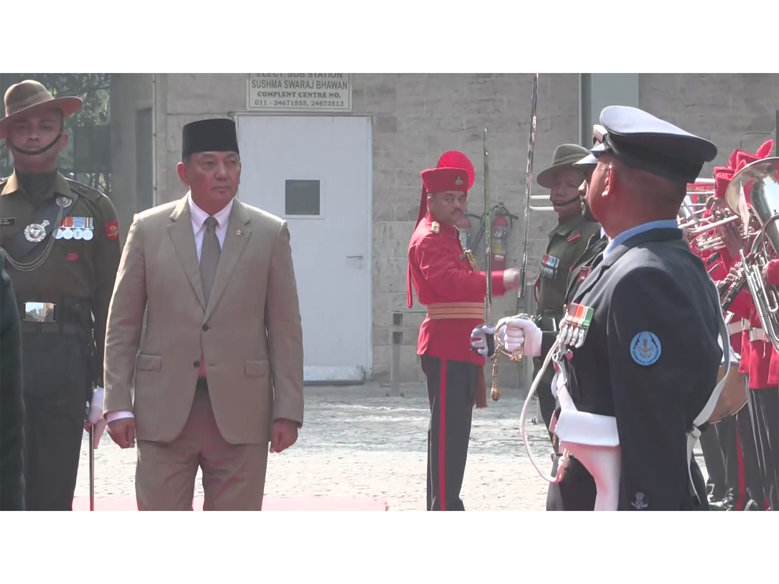 Indonesian Defence Minister Sjafrie Sjamsoeddin receives tri-services Guard of Honour