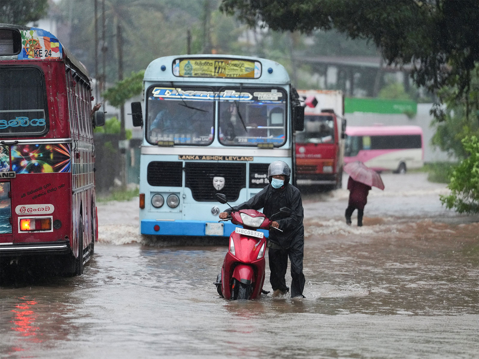 People and vehicles wade through a waterlogged street following heavy rainfall in Kelaniya People and vehicles wade through a waterlogged street following heavy rainfall in Kelaniya, Sri Lanka (Photo/Reuters) People and vehicles wade through a waterlogged street following heavy rainfall in Kelaniya People and vehicles wade through a waterlogged street following heavy rainfall in Kelaniya, Sri Lanka (Photo/Reuters)