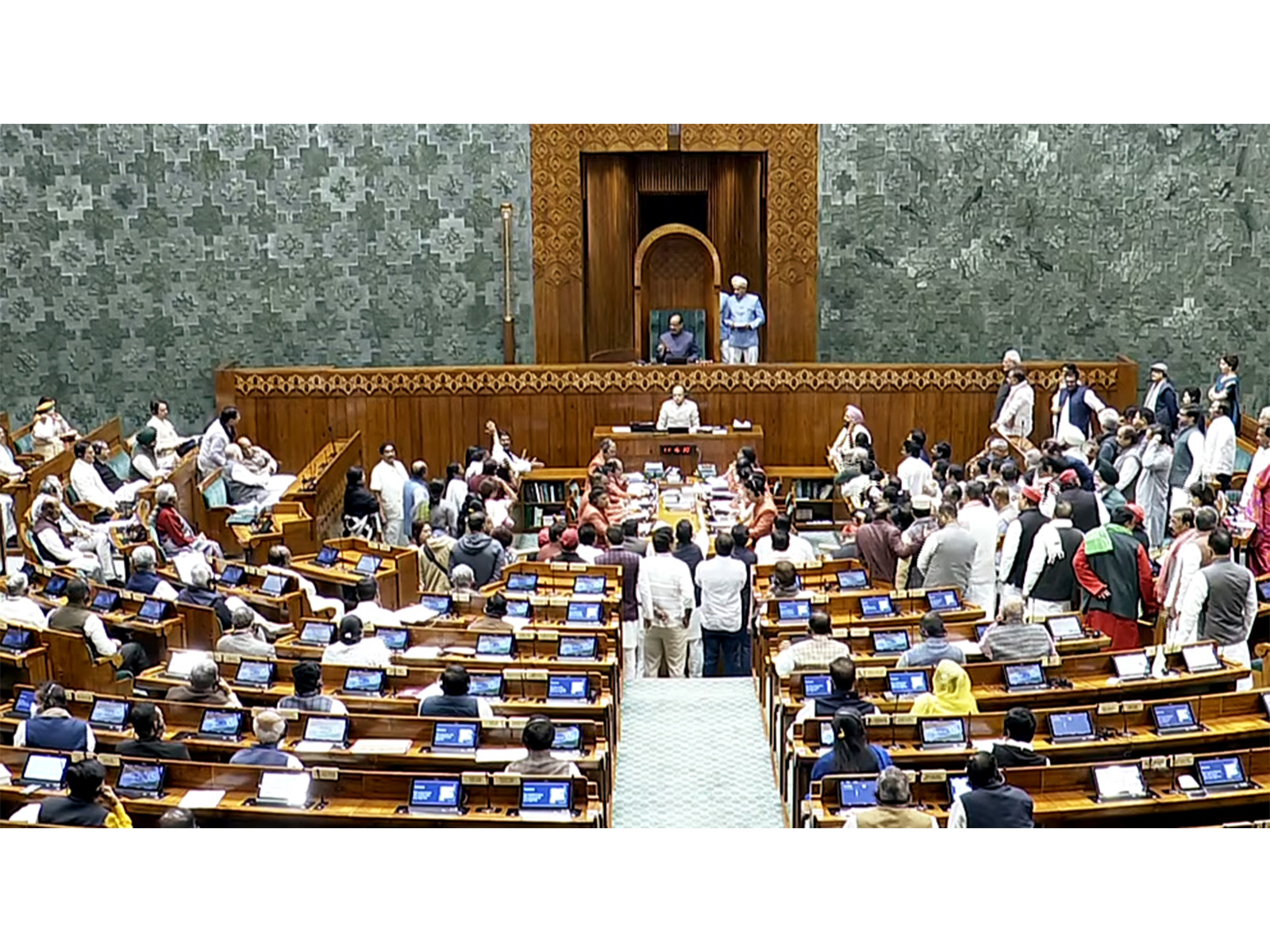 Opposition MPs create ruckus in Lok Sabha during the winter session of Parliament (Photo/SansadTV)