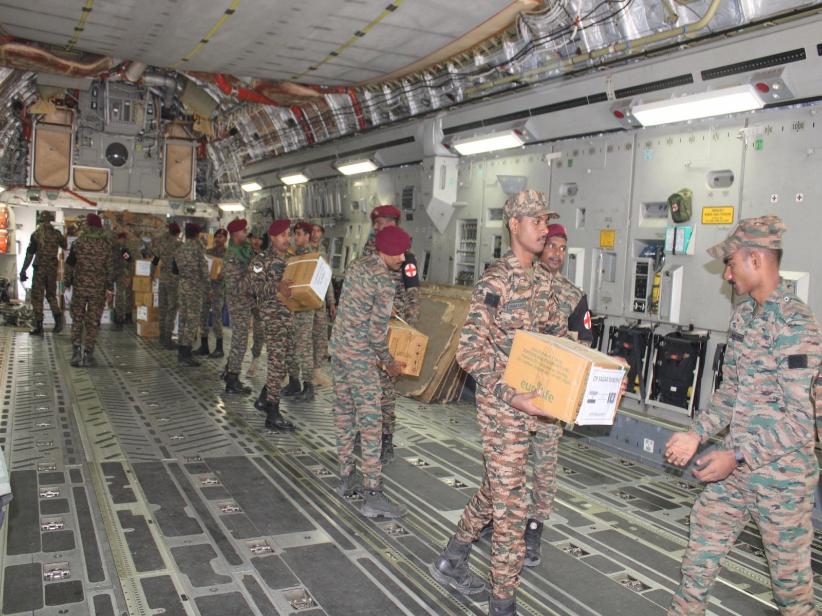 Indian Army personnel load relief supplies inside a military aircraft as part of Operation Sagar Bandhu for cyclone-hit Sri Lanka. (Photo: X/@adgpi)