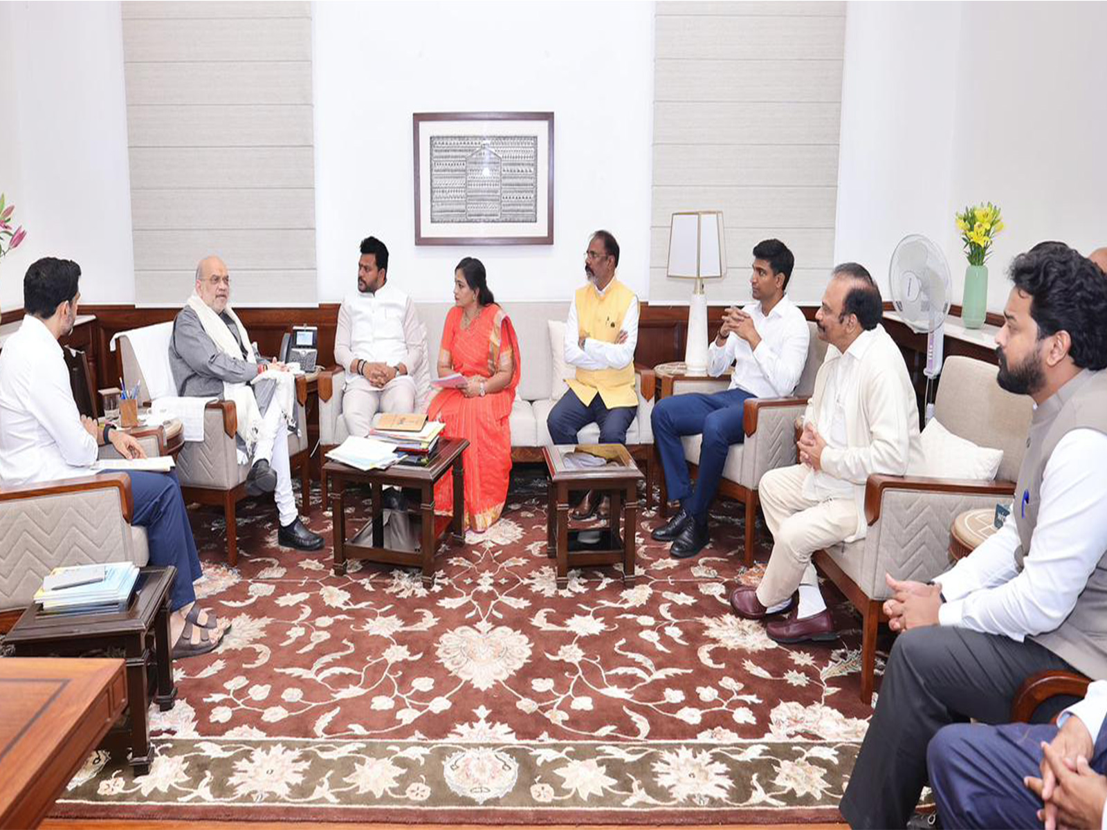 Andhra Ministers, Nara Lokesh and Vangalapudi Anitha with Union Minister Amit Shah. (Photo/ANI)