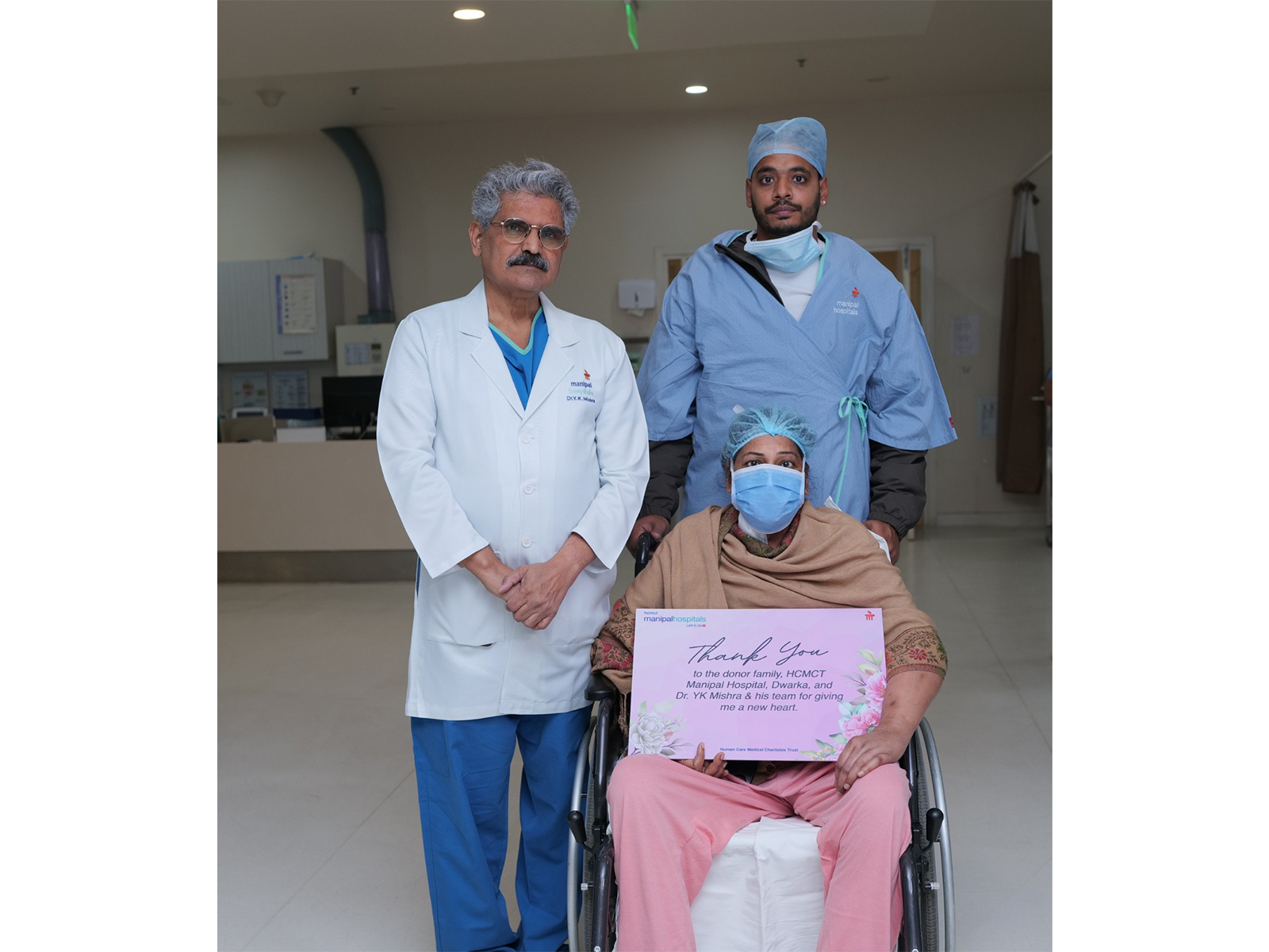 Dr Yugal Kishore Mishra and Viji Varghese, hospital director with the patient on New Delhi. (Photo/ANI)