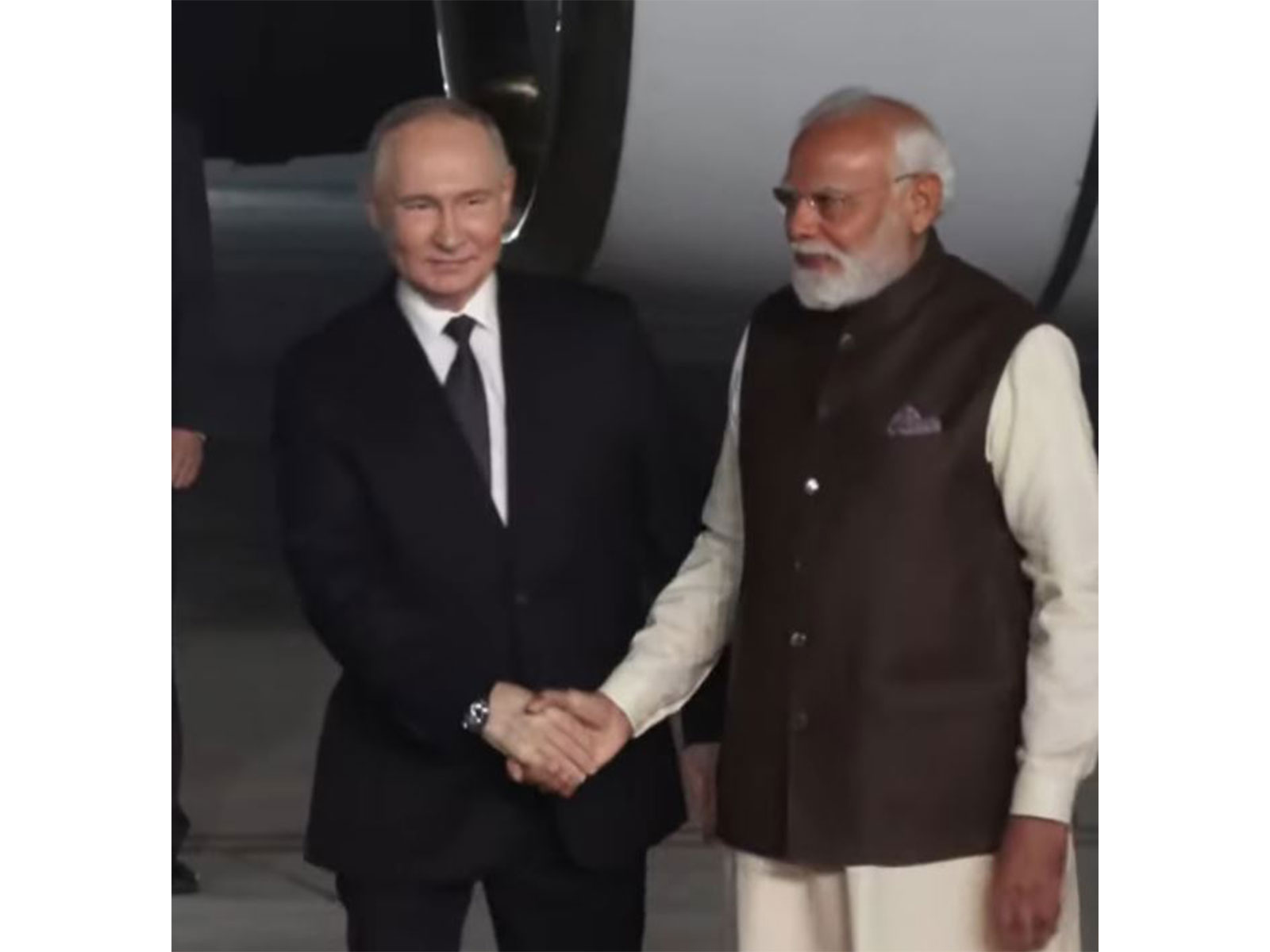 PM Modi receives Russian President Vladimir Putin as he lands in Delhi (Photo/ANI)