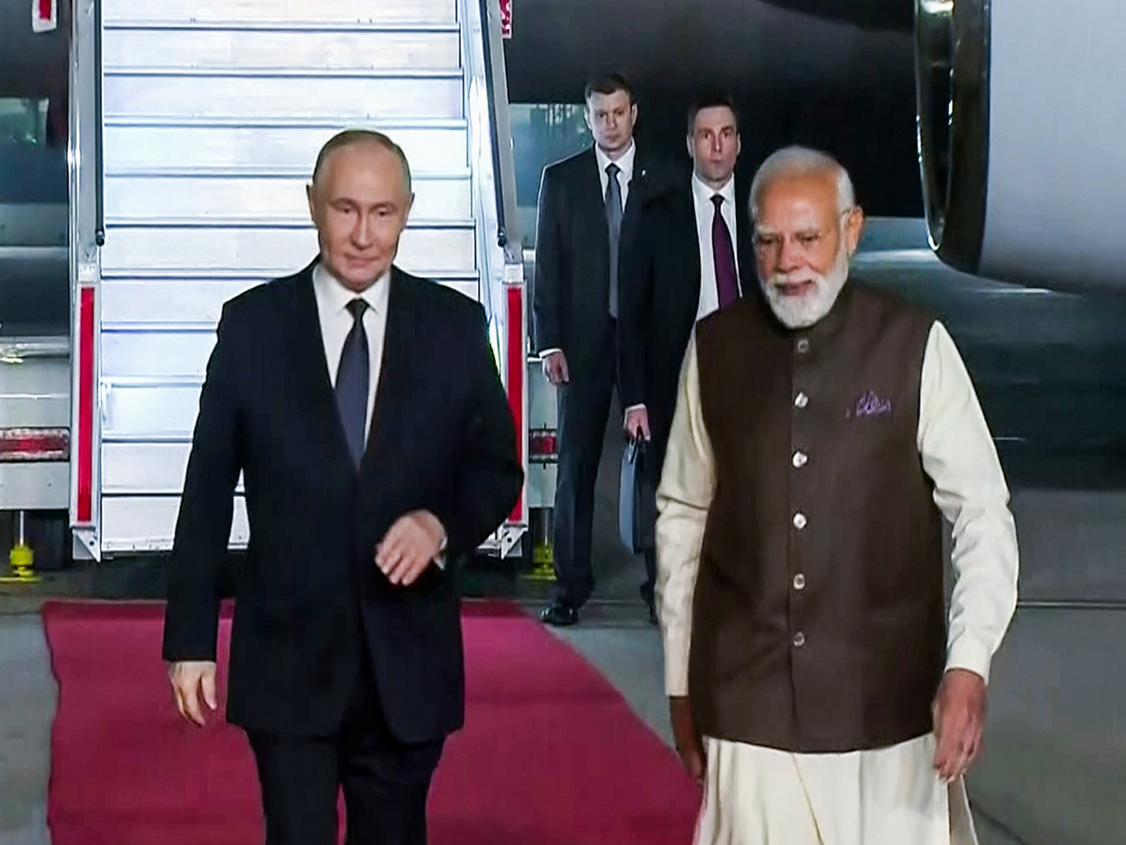PM Modi receives Russian President Vladimir Putin as he lands in Delhi (Photo/ANI)