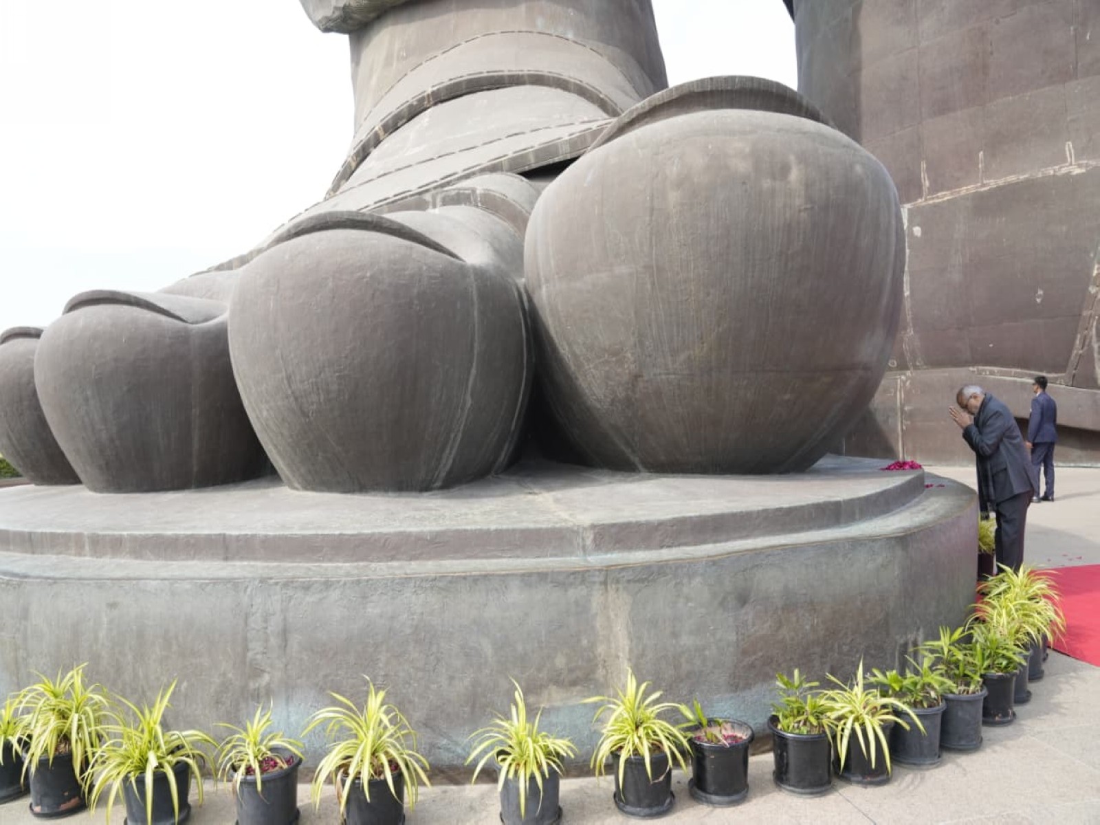 VP C P Radhakrishnan pay floral tributes to Sardar Vallabhbhai Patel at the Statue of Unity in Ekta Nagar. (Photo/ANI)