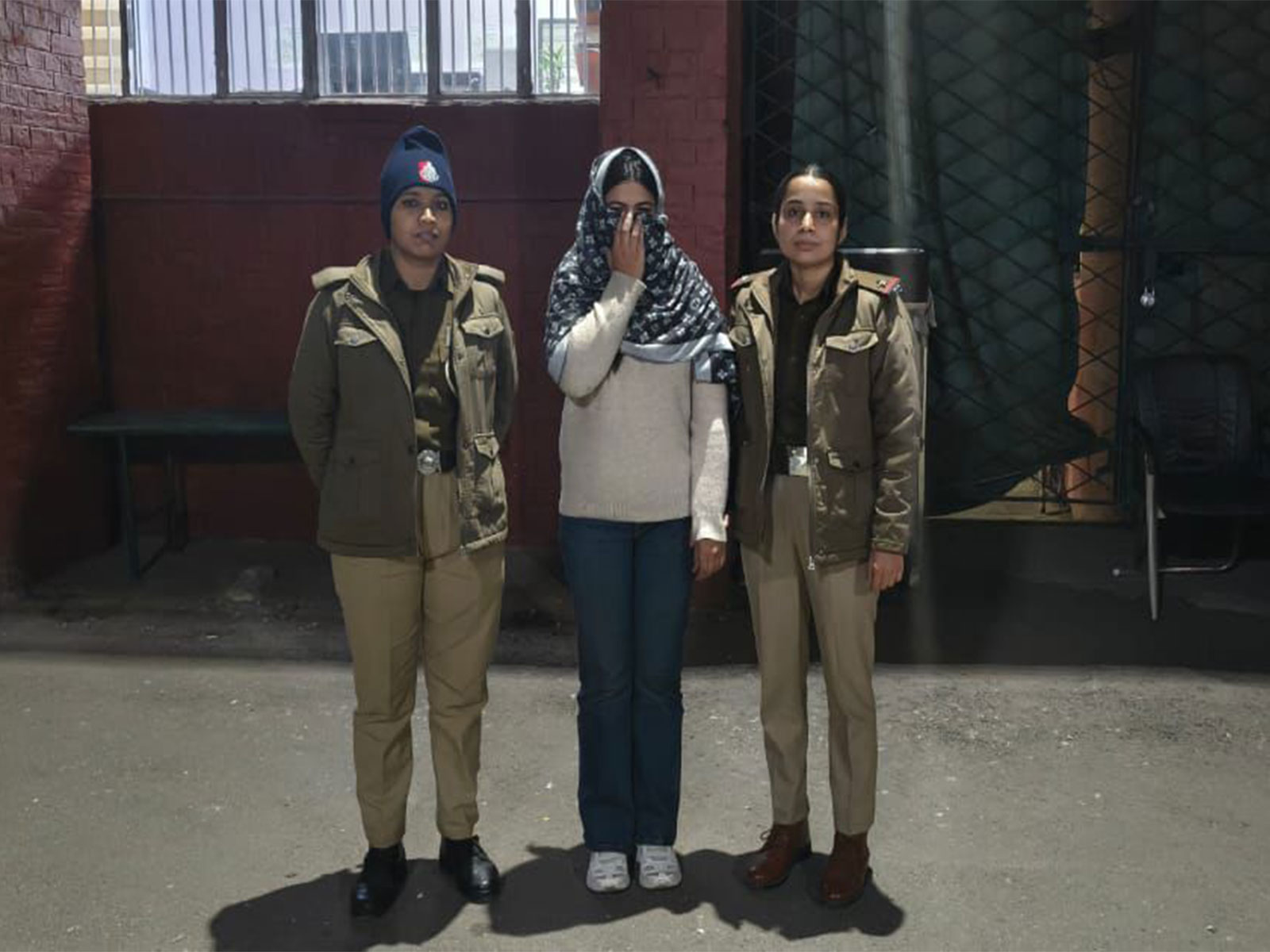 Chandigarh police with the arrested individual (Photo/ANI)