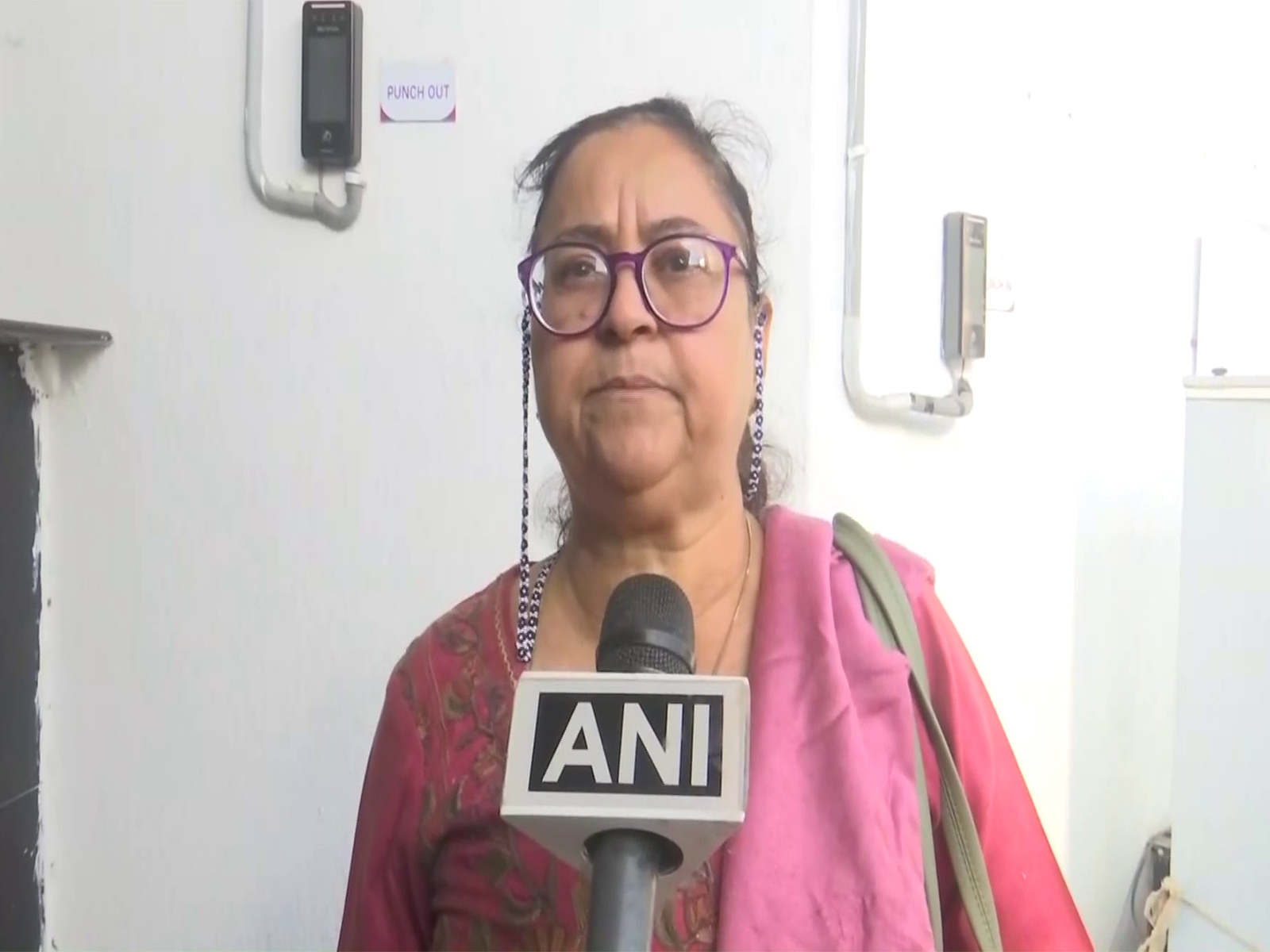 A passenger stranded at Guwahati Airport (Photo/ANI)