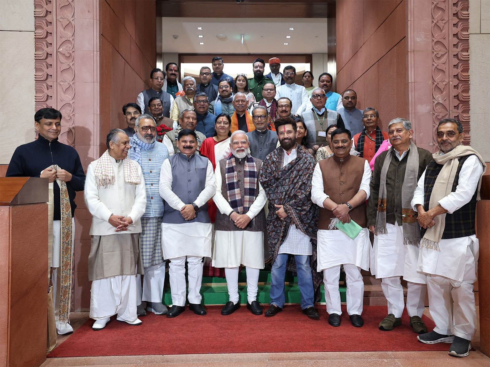 PM Narendra Modi with Bihar MPs in Parliament on Monday. (Photo/X@narendramodi)