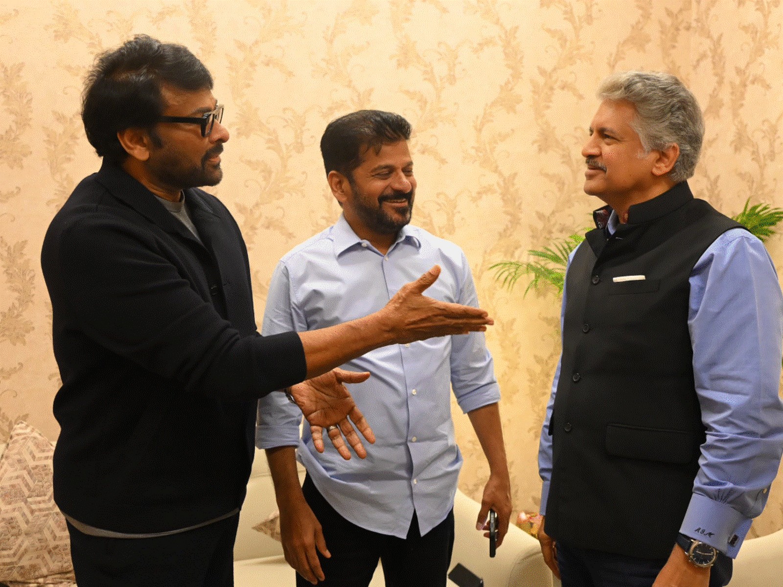 Chiranjeevi (Left), Telangana Chief Minister Revanth Reddy (Center) and Anand Mahindra (Right) (Image source: X/ @anandmahindra) Chiranjeevi (Left), Telangana Chief Minister Revanth Reddy (Center) and Anand Mahindra (Right) (Image source: X/ @anandmahindra)