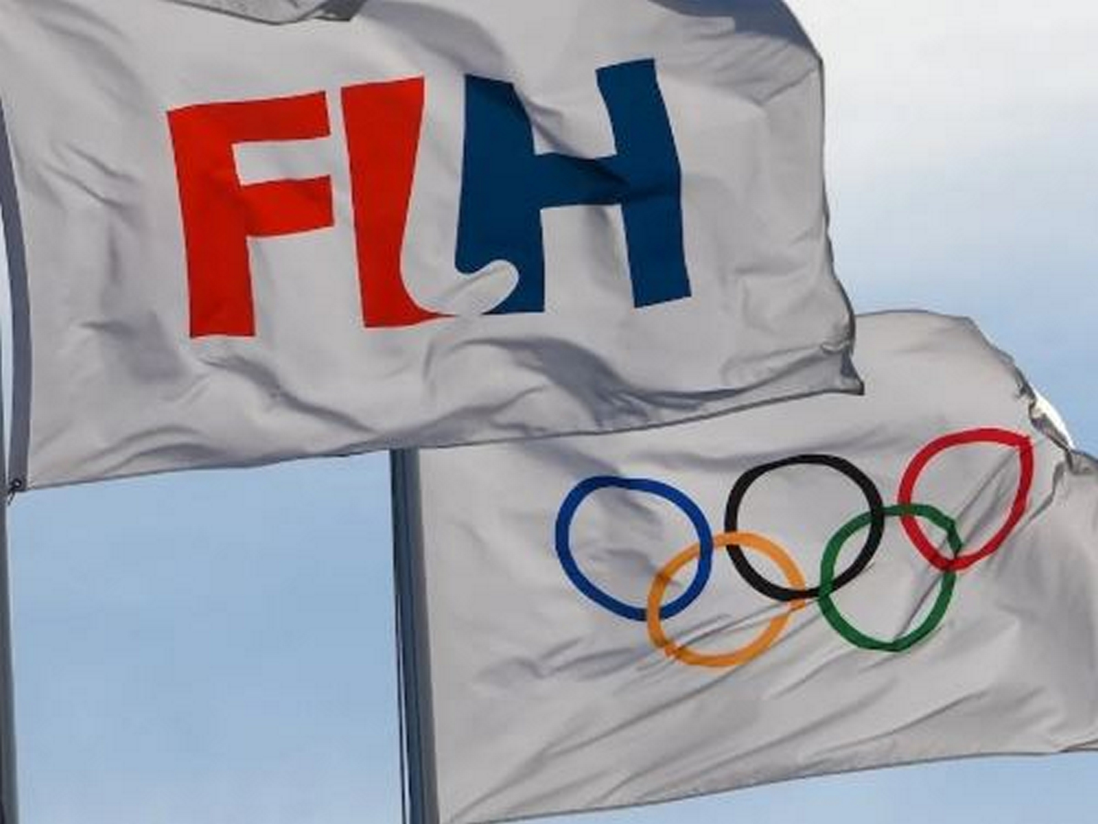 FIH and Olympics flags (Photo: FIH)