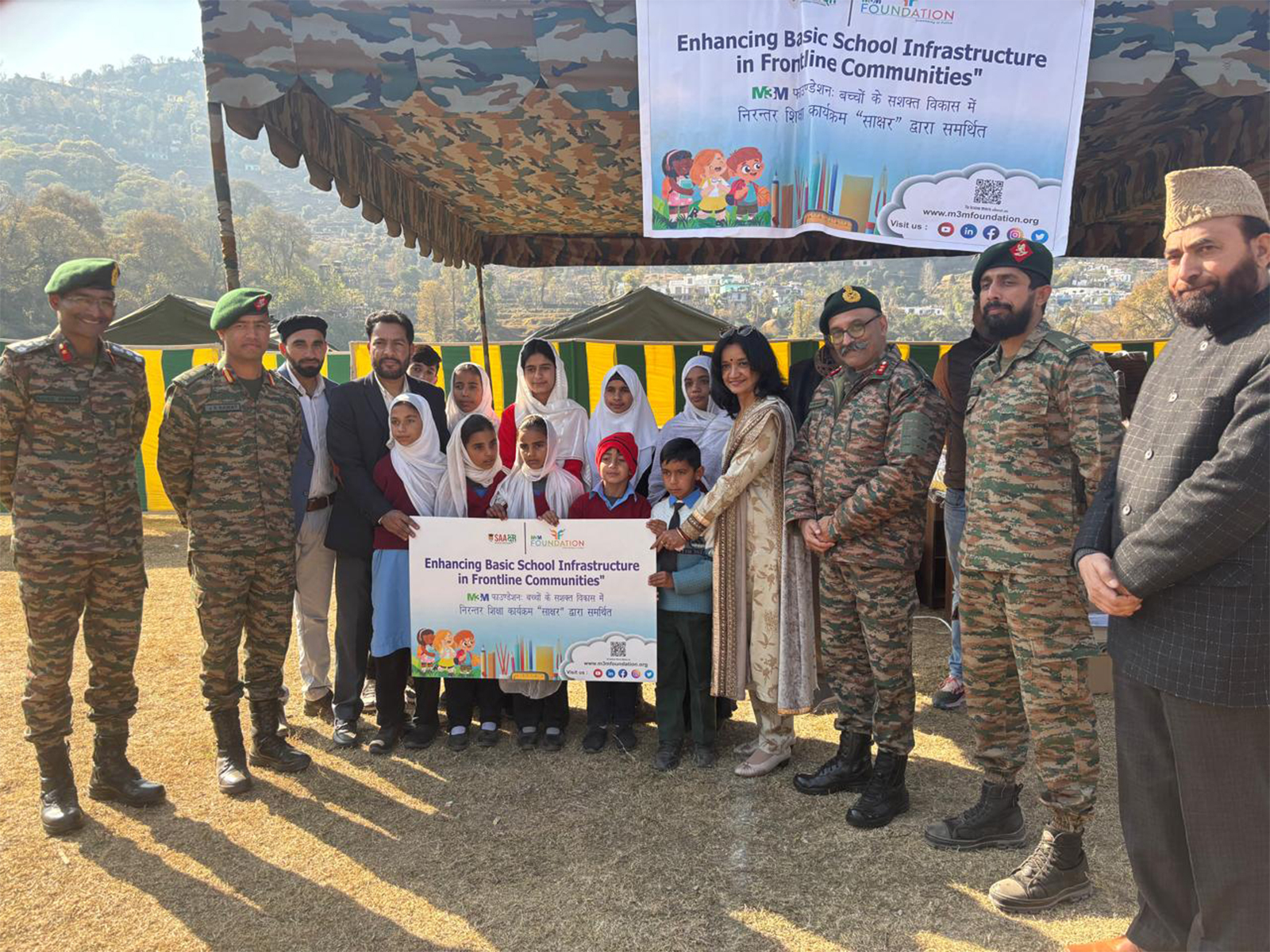 Representatives of the Indian Army, M3M Foundation and local schoolchildren at the school infrastructure handover ceremony in the LoC region of Poonch