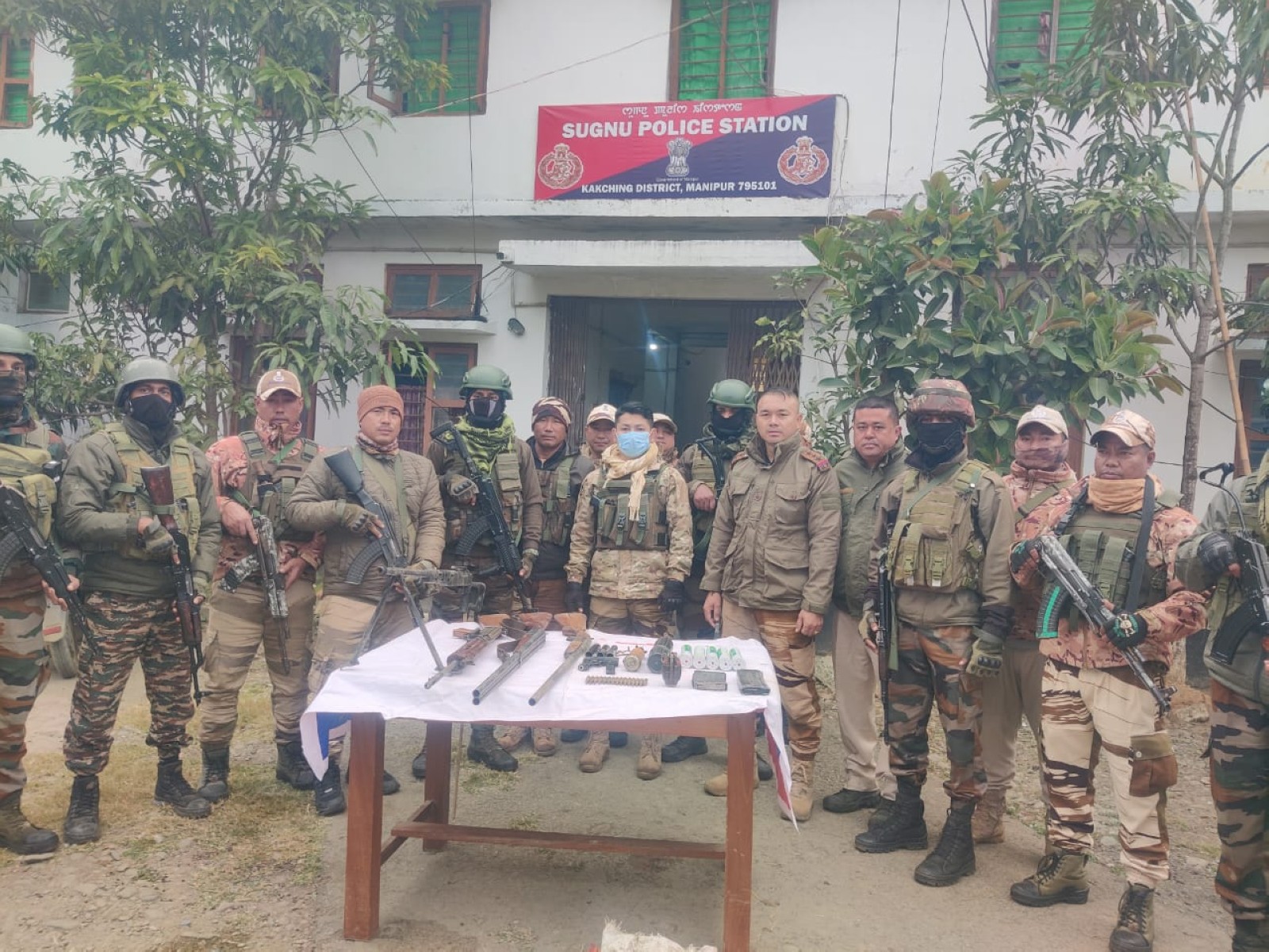 Manipur Police with the cache of recovered arms. (Photo/Manipur Police) Manipur Police with the cache of recovered arms. (Photo/Manipur Police)
