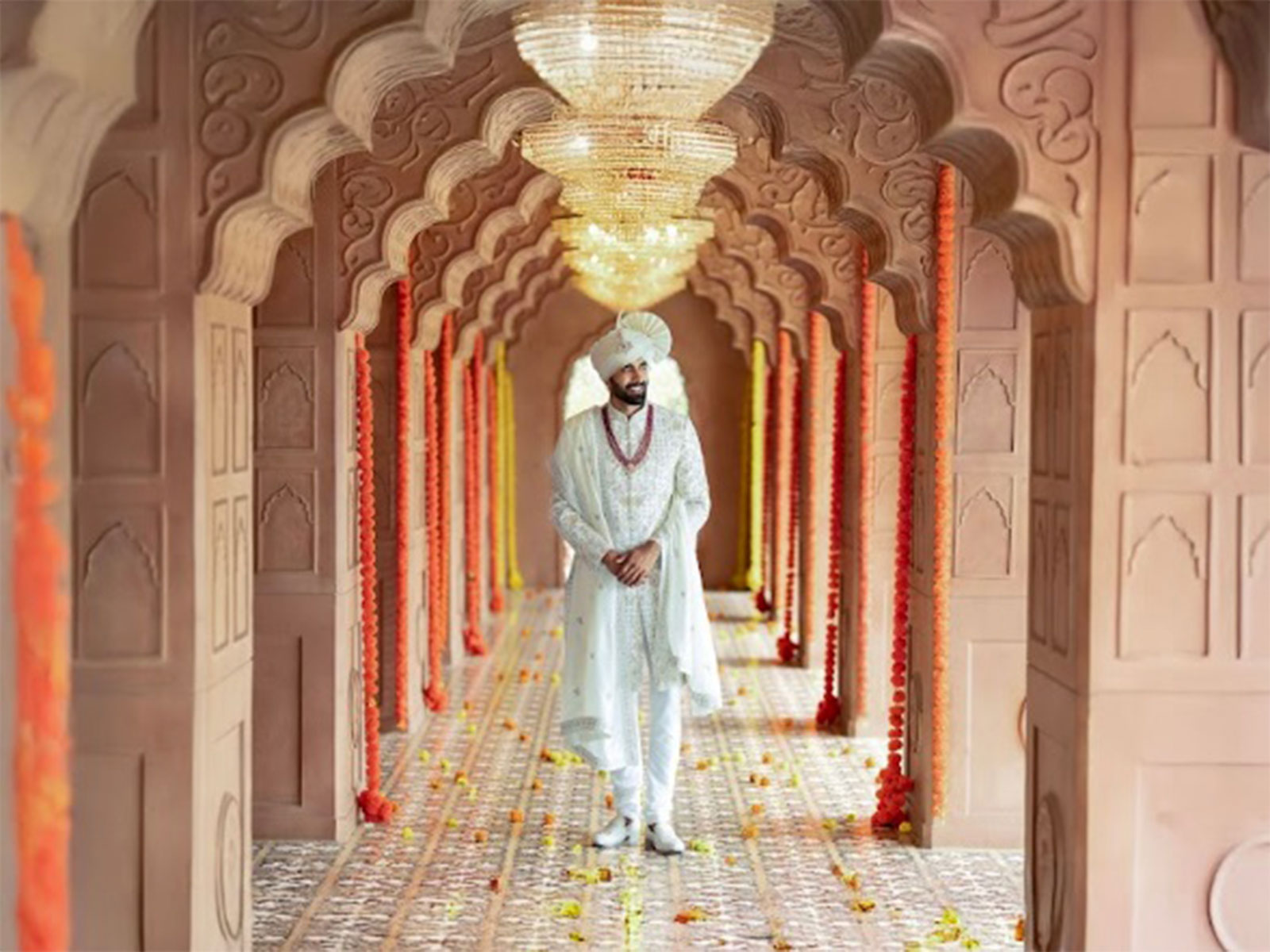 Devo's traditional elegant white sherwani