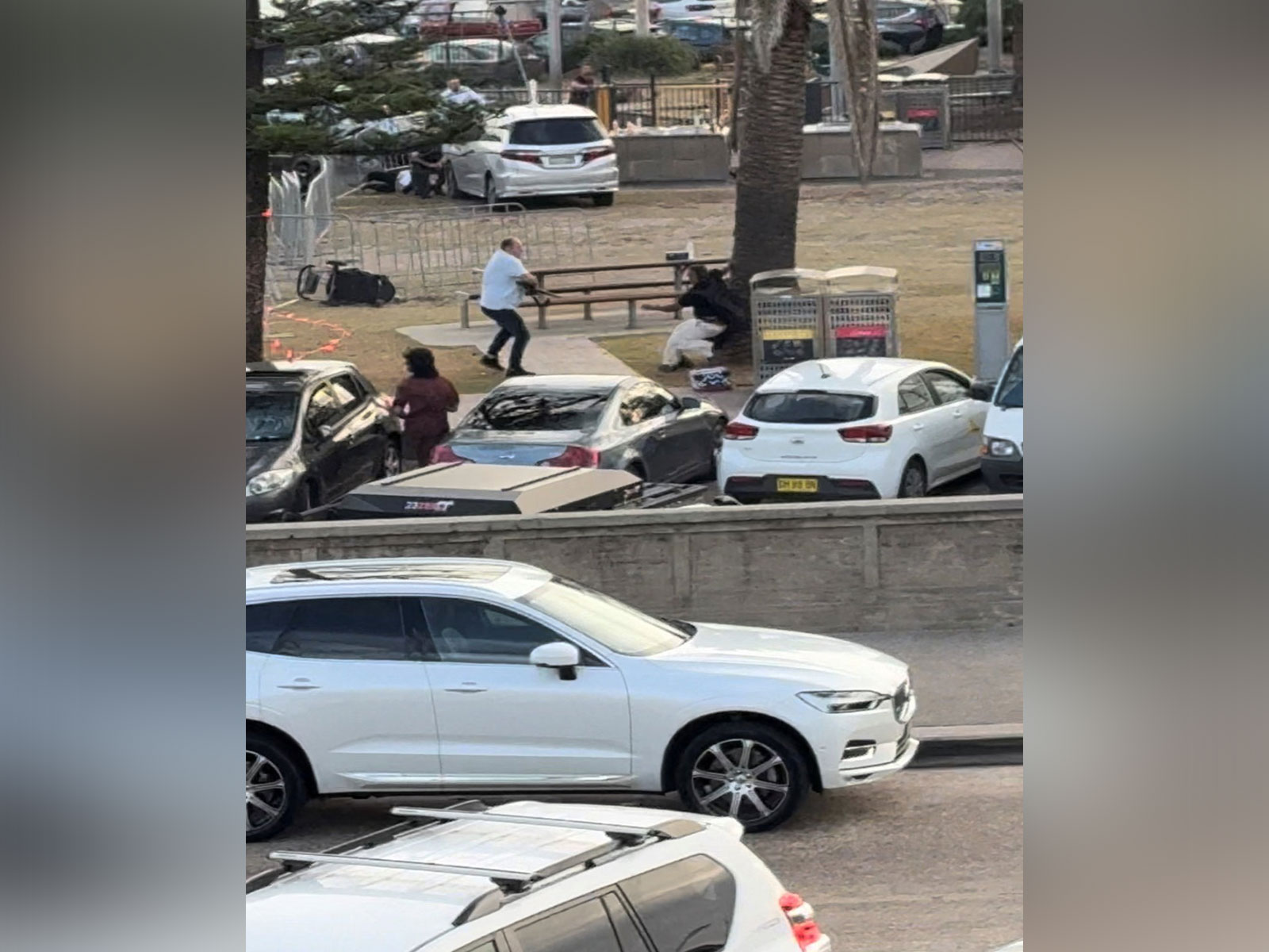 A gunman is disarmed in Bondi Beach, Sydney, Australia, December 14, 2025, in this screengrab from video. (Photo/Reuters)