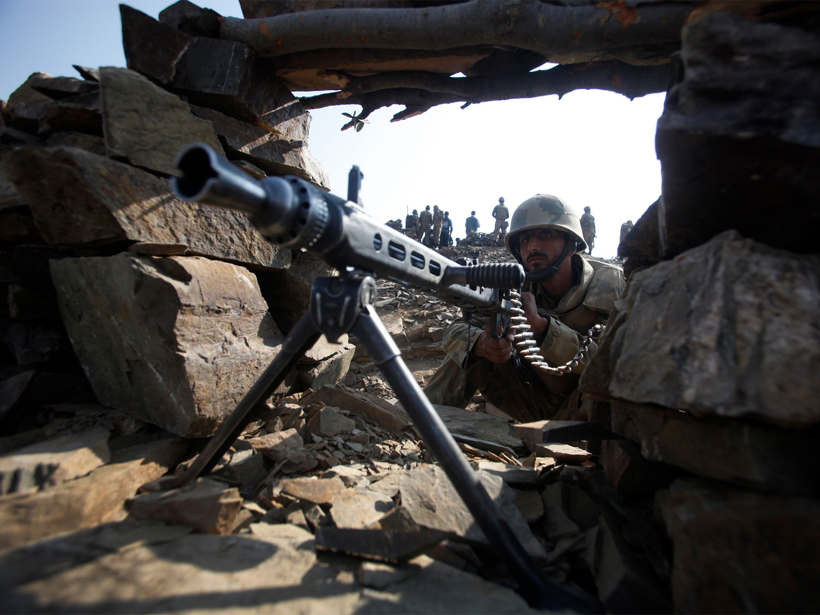 A Pakistani soldier holds a machine gun on top of a mountain in South Waziristan (File Photo/ Reuters) A Pakistani soldier holds a machine gun on top of a mountain in South Waziristan (File Photo/ Reuters)