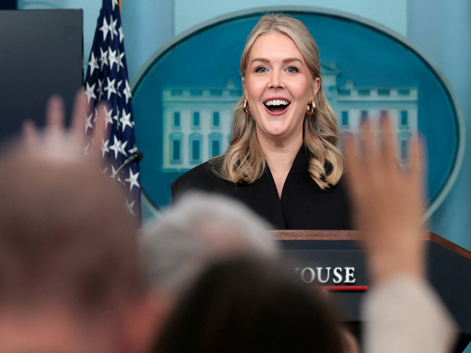 Hands are raised as White House press secretary Karoline Leavitt reacts during a press briefing at the White House (Photo/Reuters) Hands are raised as White House press secretary Karoline Leavitt reacts during a press briefing at the White House (Photo/Reuters)