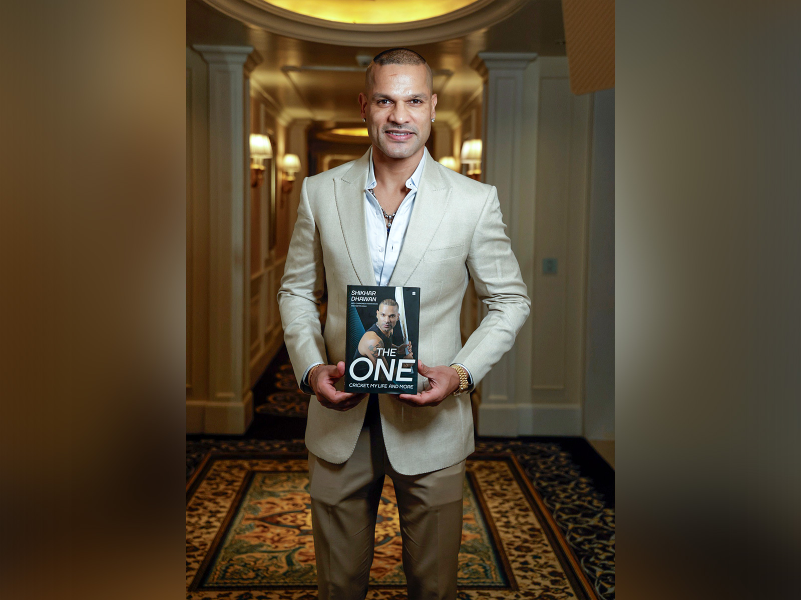 Shikhar Dhawan unveils autobiography The One: (Photo: ANI)