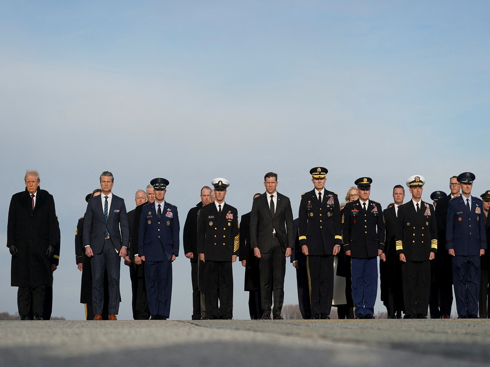 U.S. President Donald Trump, Secretary of Defense Pete Hegseth, Chairman of the Joint Chiefs of Staff General Dan Caine and Senior Enlisted Advisor to the Chairman of the Joint Chiefs of Staff (SEAC) David Isom participate in a dignified transfer of the remains of two Iowa National Guard members killed in Syria (Photo/Reuters)