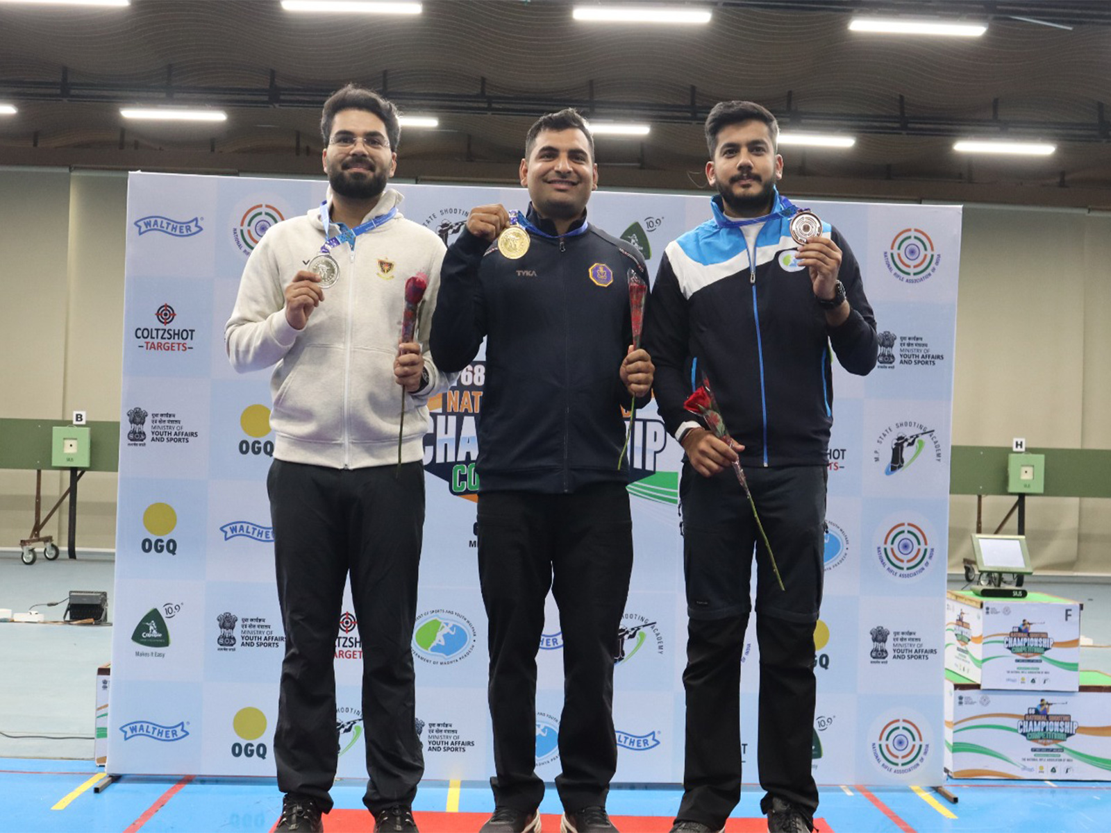 Arjun Babuta, Kiran Ankush Jadhav (centre) and Aishwary Pratap Singh Tomar after winning gold in National Shooting Championship Competitions (Image: NRAI media)