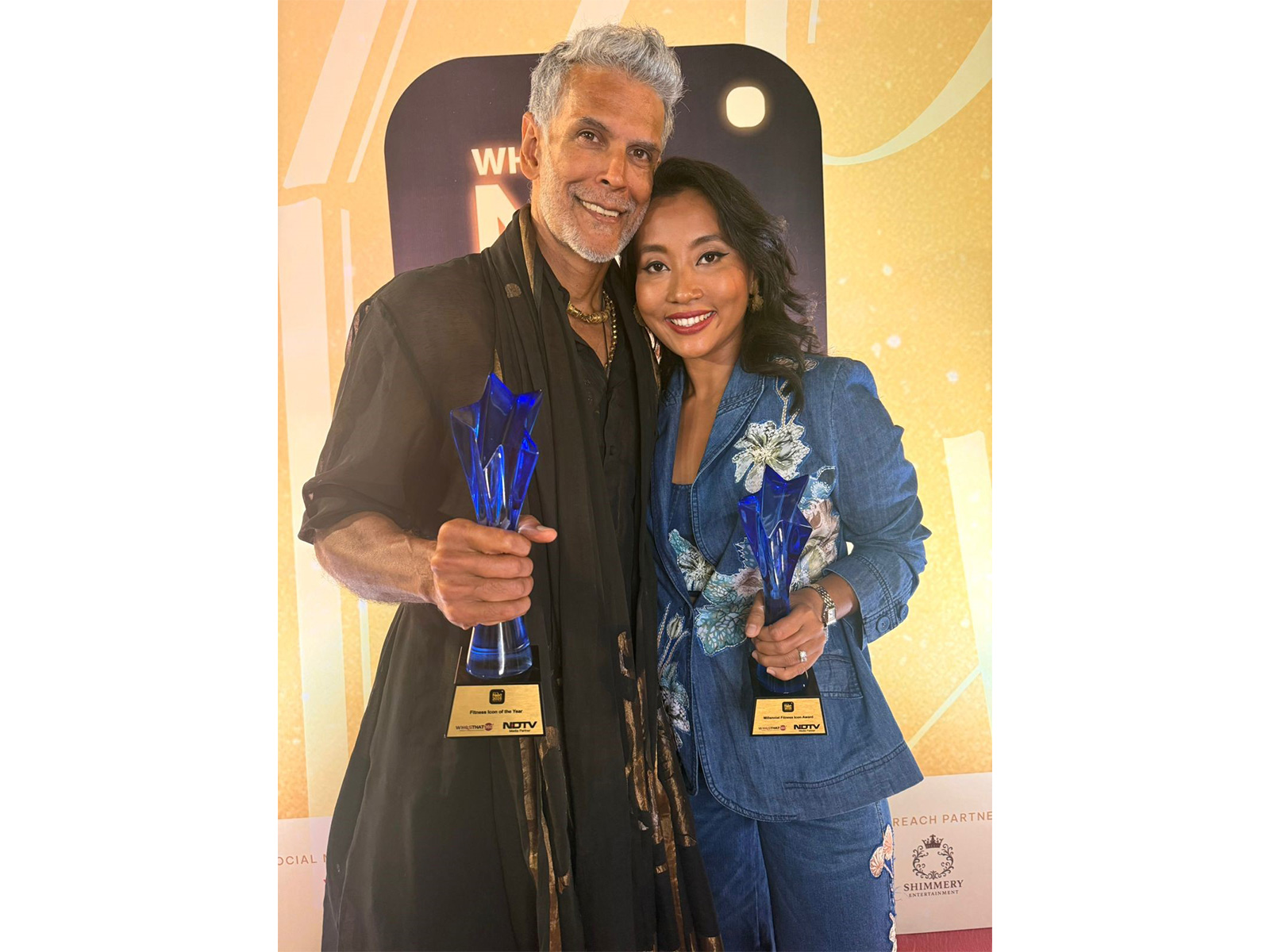 Milind Soman with Ankita Konwar at the NDTV Who’s Next 2025 Awards, celebrating impact-driven fitness advocacy.