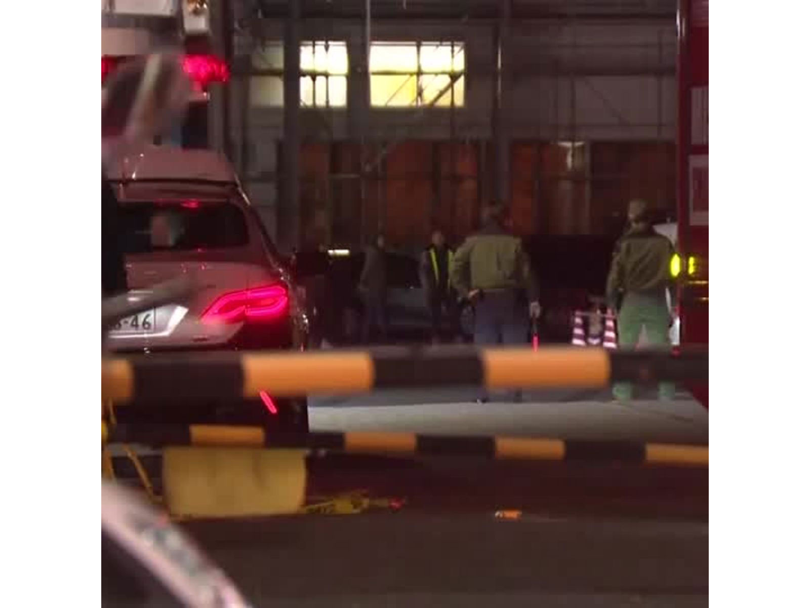 Emergency services at a rubber factory in Mishima, Japan, following reports of a stabbing incident. (Photo/Reuters)