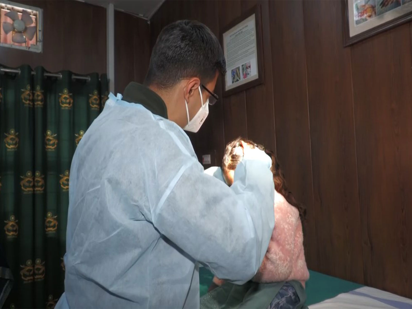 Doctor treats burn injuries in Poonch (Photo/ANI)