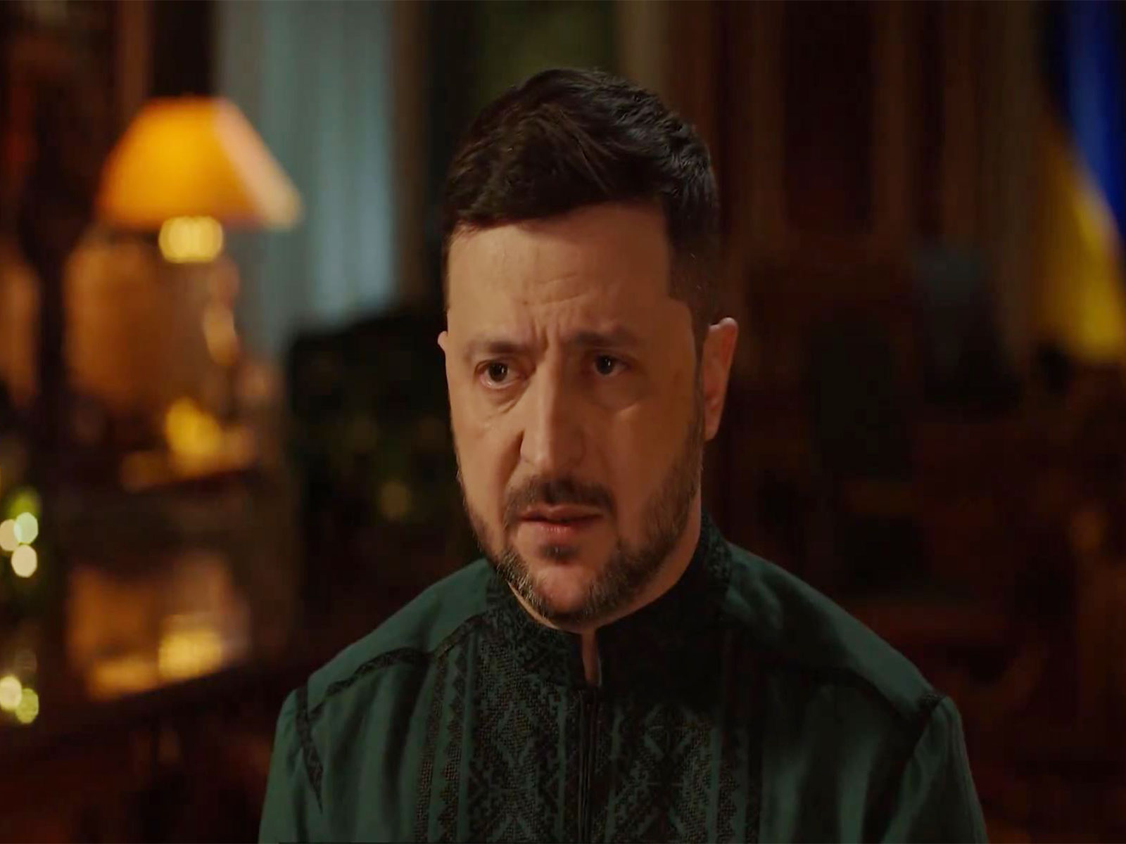 Ukrainian President Volodymyr Zelenskyy delivers his New Year address from his office in Kyiv. (Photo: X/@ZelenskyyUa)